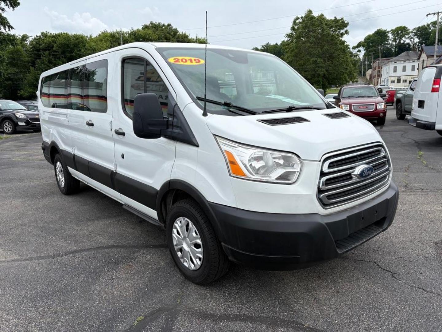 2019 WHITE FORD TRANSIT T-350 XLT (1FBZX2ZM7KK) with an 3.7L engine, Automatic transmission, located at 501 E. Columbia St., Springfield, OH, 45503, (800) 262-7122, 39.925262, -83.801796 - *** Clean CarFax w/ 25 Service Records *** Oil Change *** Inspection *** New Cabin and Air filter *** New Battery *** New Brakes *** 15 Passenger *** OPTIONAL EQUIPMENT/OTHER PREFERRED EQUIPMENT PKG.302A 3.73 RATIO REGULAR AXLE X73 9000# GVWR PACKAGE CHARCOAL CLOTH 2WAY SD ARBAGS 50 STATE E - Photo#0