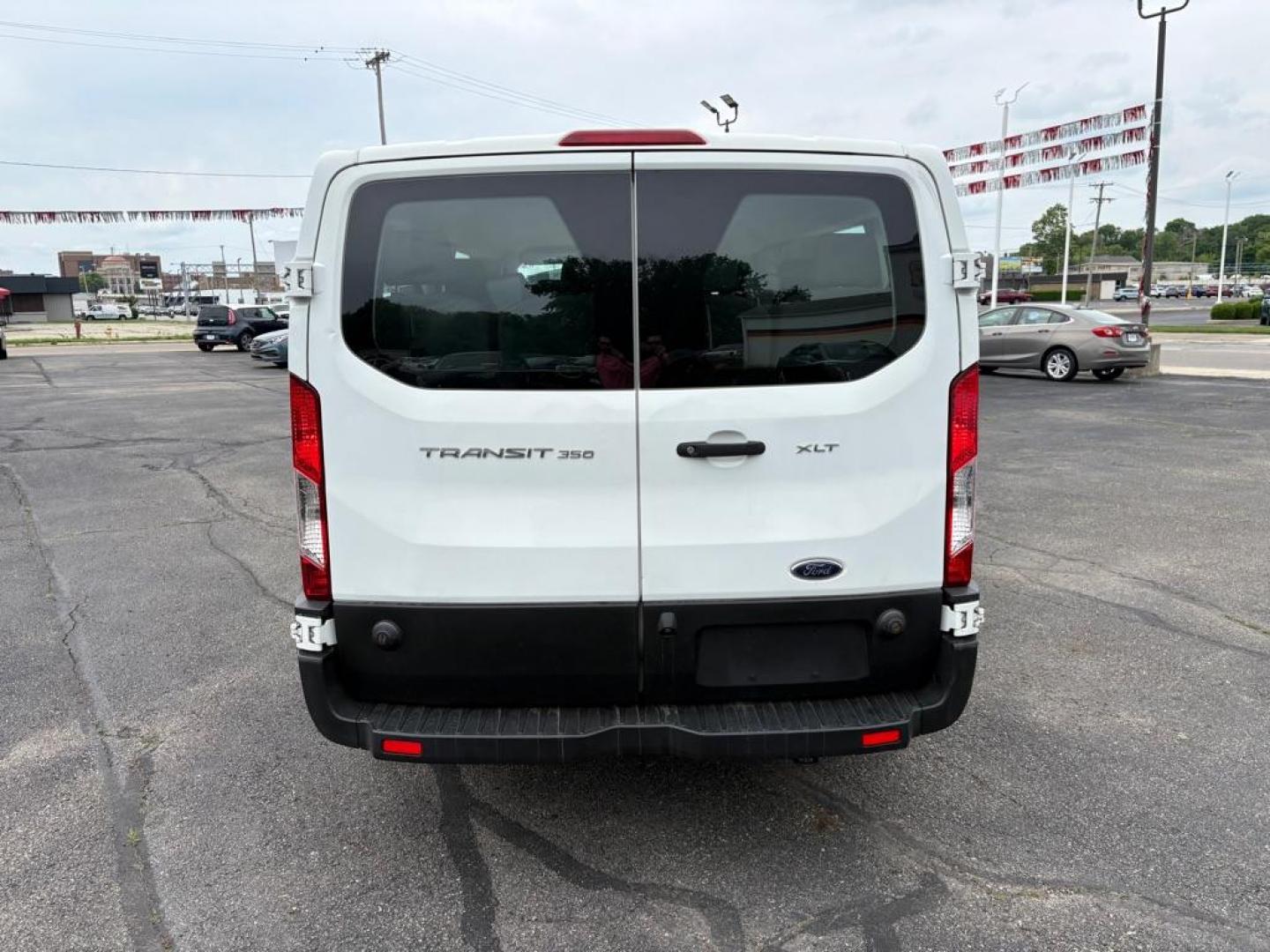 2019 WHITE FORD TRANSIT T-350 XLT (1FBZX2ZM7KK) with an 3.7L engine, Automatic transmission, located at 501 E. Columbia St., Springfield, OH, 45503, (800) 262-7122, 39.925262, -83.801796 - *** Clean CarFax w/ 25 Service Records *** Oil Change *** Inspection *** New Cabin and Air filter *** New Battery *** New Brakes *** 15 Passenger *** OPTIONAL EQUIPMENT/OTHER PREFERRED EQUIPMENT PKG.302A 3.73 RATIO REGULAR AXLE X73 9000# GVWR PACKAGE CHARCOAL CLOTH 2WAY SD ARBAGS 50 STATE E - Photo#3