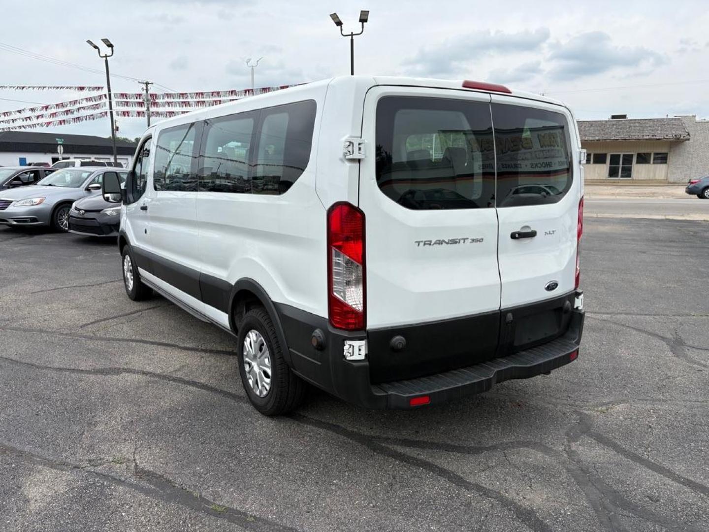 2019 WHITE FORD TRANSIT T-350 XLT (1FBZX2ZM7KK) with an 3.7L engine, Automatic transmission, located at 501 E. Columbia St., Springfield, OH, 45503, (800) 262-7122, 39.925262, -83.801796 - *** Clean CarFax w/ 25 Service Records *** Oil Change *** Inspection *** New Cabin and Air filter *** New Battery *** New Brakes *** 15 Passenger *** OPTIONAL EQUIPMENT/OTHER PREFERRED EQUIPMENT PKG.302A 3.73 RATIO REGULAR AXLE X73 9000# GVWR PACKAGE CHARCOAL CLOTH 2WAY SD ARBAGS 50 STATE E - Photo#4