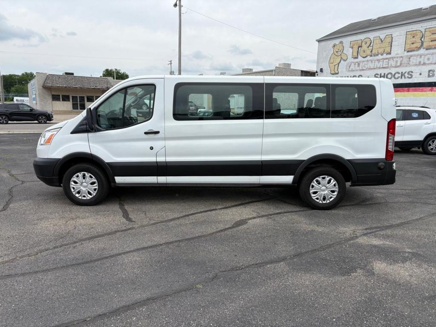 2019 WHITE FORD TRANSIT T-350 XLT (1FBZX2ZM7KK) with an 3.7L engine, Automatic transmission, located at 501 E. Columbia St., Springfield, OH, 45503, (800) 262-7122, 39.925262, -83.801796 - *** Clean CarFax w/ 25 Service Records *** Oil Change *** Inspection *** New Cabin and Air filter *** New Battery *** New Brakes *** 15 Passenger *** OPTIONAL EQUIPMENT/OTHER PREFERRED EQUIPMENT PKG.302A 3.73 RATIO REGULAR AXLE X73 9000# GVWR PACKAGE CHARCOAL CLOTH 2WAY SD ARBAGS 50 STATE E - Photo#5