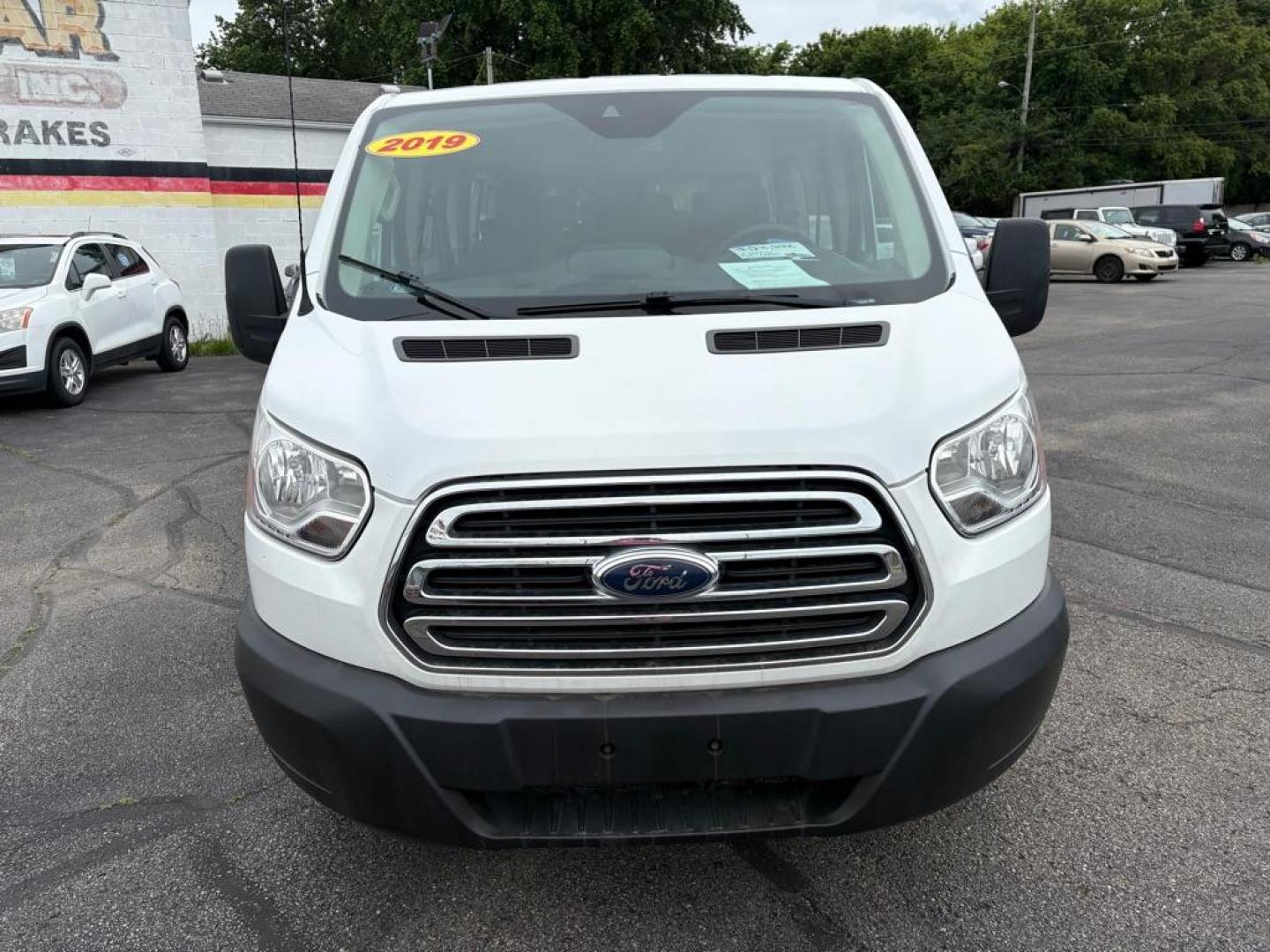 2019 WHITE FORD TRANSIT T-350 XLT (1FBZX2ZM7KK) with an 3.7L engine, Automatic transmission, located at 501 E. Columbia St., Springfield, OH, 45503, (800) 262-7122, 39.925262, -83.801796 - *** Clean CarFax w/ 25 Service Records *** Oil Change *** Inspection *** New Cabin and Air filter *** New Battery *** New Brakes *** 15 Passenger *** OPTIONAL EQUIPMENT/OTHER PREFERRED EQUIPMENT PKG.302A 3.73 RATIO REGULAR AXLE X73 9000# GVWR PACKAGE CHARCOAL CLOTH 2WAY SD ARBAGS 50 STATE E - Photo#7