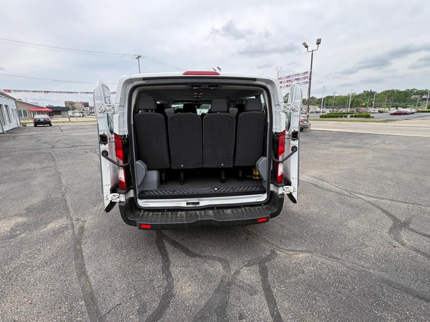 2019 WHITE FORD TRANSIT T-350 XLT (1FBZX2ZM7KK) with an 3.7L engine, Automatic transmission, located at 501 E. Columbia St., Springfield, OH, 45503, (800) 262-7122, 39.925262, -83.801796 - *** Clean CarFax w/ 25 Service Records *** Oil Change *** Inspection *** New Cabin and Air filter *** New Battery *** New Brakes *** 15 Passenger *** OPTIONAL EQUIPMENT/OTHER PREFERRED EQUIPMENT PKG.302A 3.73 RATIO REGULAR AXLE X73 9000# GVWR PACKAGE CHARCOAL CLOTH 2WAY SD ARBAGS 50 STATE E - Photo#12