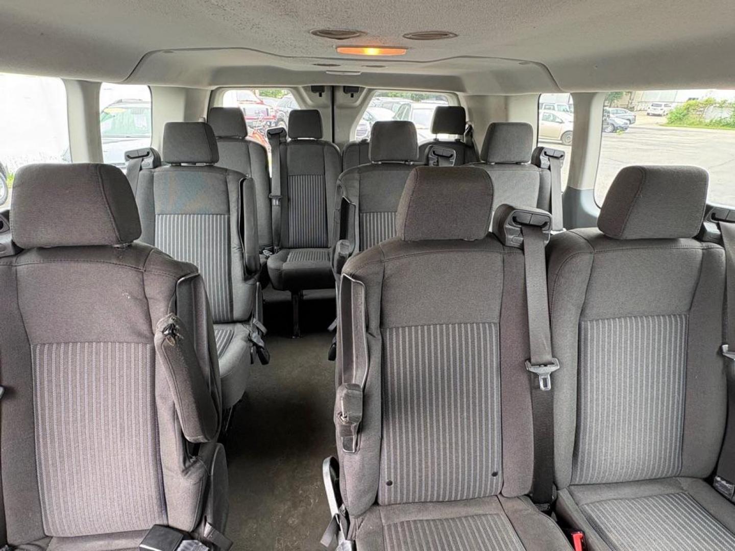 2019 WHITE FORD TRANSIT T-350 XLT (1FBZX2ZM7KK) with an 3.7L engine, Automatic transmission, located at 501 E. Columbia St., Springfield, OH, 45503, (800) 262-7122, 39.925262, -83.801796 - *** Clean CarFax w/ 25 Service Records *** Oil Change *** Inspection *** New Cabin and Air filter *** New Battery *** New Brakes *** 15 Passenger *** OPTIONAL EQUIPMENT/OTHER PREFERRED EQUIPMENT PKG.302A 3.73 RATIO REGULAR AXLE X73 9000# GVWR PACKAGE CHARCOAL CLOTH 2WAY SD ARBAGS 50 STATE E - Photo#15