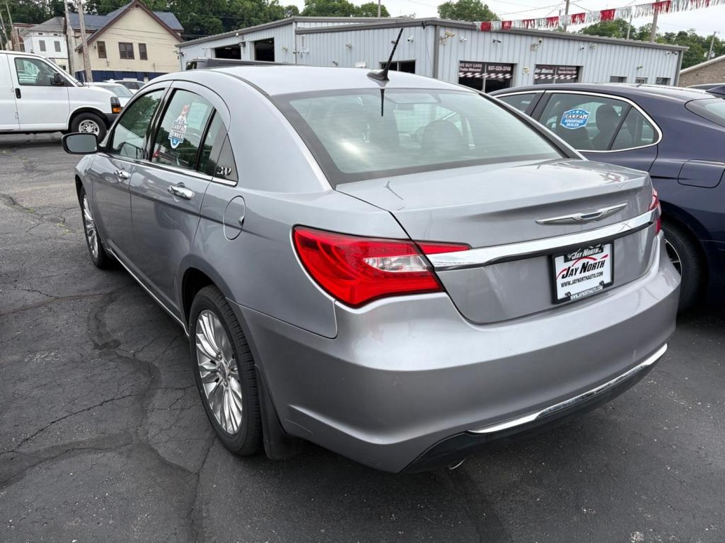 2013 SILVER CHRYSLER 200 LIMITED (1C3CCBCG3DN) with an 3.6L engine, Automatic transmission, located at 501 E. Columbia St., Springfield, OH, 45503, (800) 262-7122, 39.925262, -83.801796 - *** New Tires *** Limited V6 *** 1 Owner w/ Clean CarFax *** Premium Audio *** Leather *** Moonroof *** New Battery *** New Cabin and Air filter *** Inspection *** NICE *** Jay North Auto has offered hand picked vehicles since 1965! Our customer's enjoy a NO pressure buying experience with a s - Photo#3