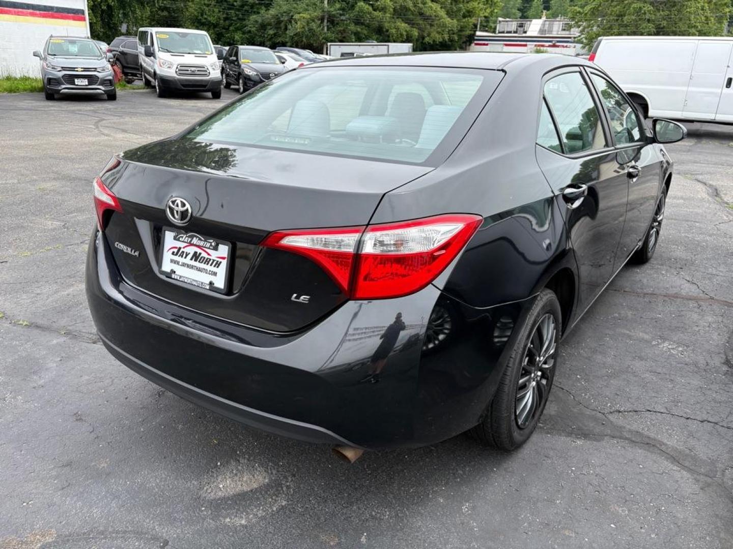 2014 BLACK TOYOTA COROLLA LE (2T1BURHE5EC) with an 1.8L engine, Automatic transmission, located at 501 E. Columbia St., Springfield, OH, 45503, (800) 262-7122, 39.925262, -83.801796 - *** Tune Up *** New Cabin and Air filter *** Inspection *** New wipers *** Oil Change *** FWD *** Jay North Auto has offered hand picked vehicles since 1965! Our customer's enjoy a NO pressure buying experience with a small town feel. We are a preferred dealer for many local credit unions an - Photo#1