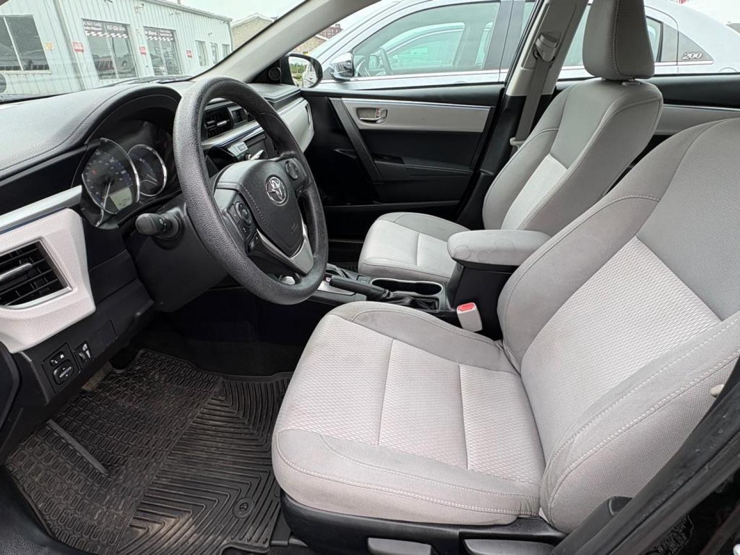 2014 BLACK TOYOTA COROLLA LE (2T1BURHE5EC) with an 1.8L engine, Automatic transmission, located at 501 E. Columbia St., Springfield, OH, 45503, (800) 262-7122, 39.925262, -83.801796 - *** Tune Up *** New Cabin and Air filter *** Inspection *** New wipers *** Oil Change *** FWD *** Jay North Auto has offered hand picked vehicles since 1965! Our customer's enjoy a NO pressure buying experience with a small town feel. We are a preferred dealer for many local credit unions an - Photo#8
