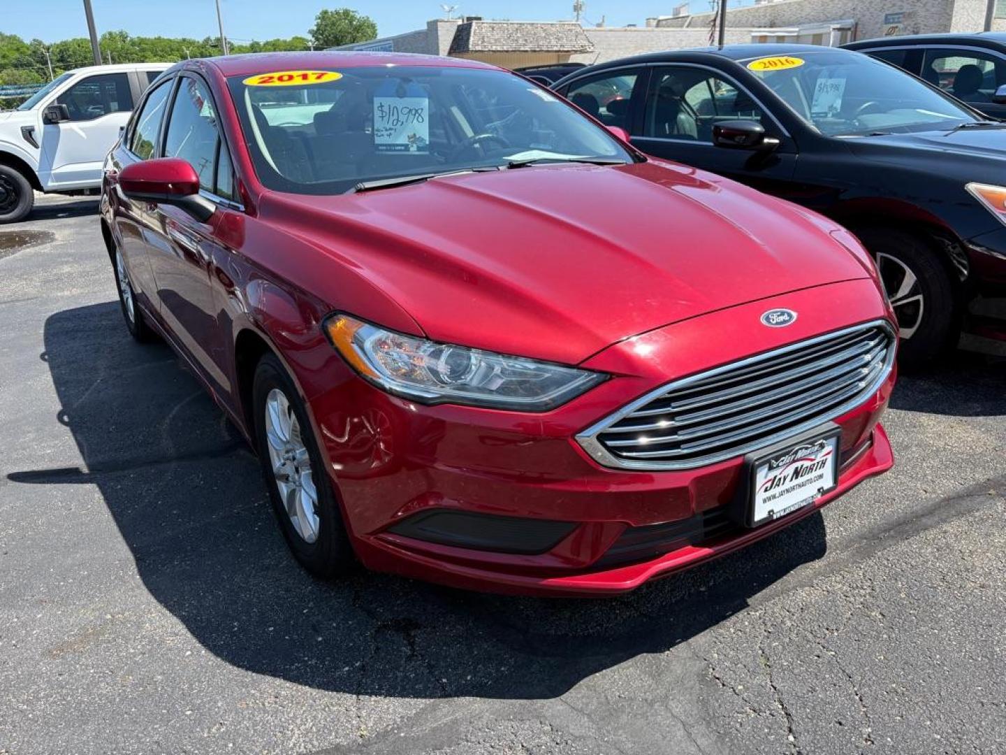 2017 RED FORD FUSION S (3FA6P0G73HR) with an 2.5L engine, Automatic transmission, located at 501 E. Columbia St., Springfield, OH, 45503, (800) 262-7122, 39.925262, -83.801796 - *** Low miles *** Tune Up *** New Front Brakes *** Oil Change *** New Battery *** New Cabin and Air filter*** Jay North Auto has offered hand picked vehicles since 1965! Our customer's enjoy a NO pressure buying experience with a small town feel. We are a preferred dealer for many local credit - Photo#0
