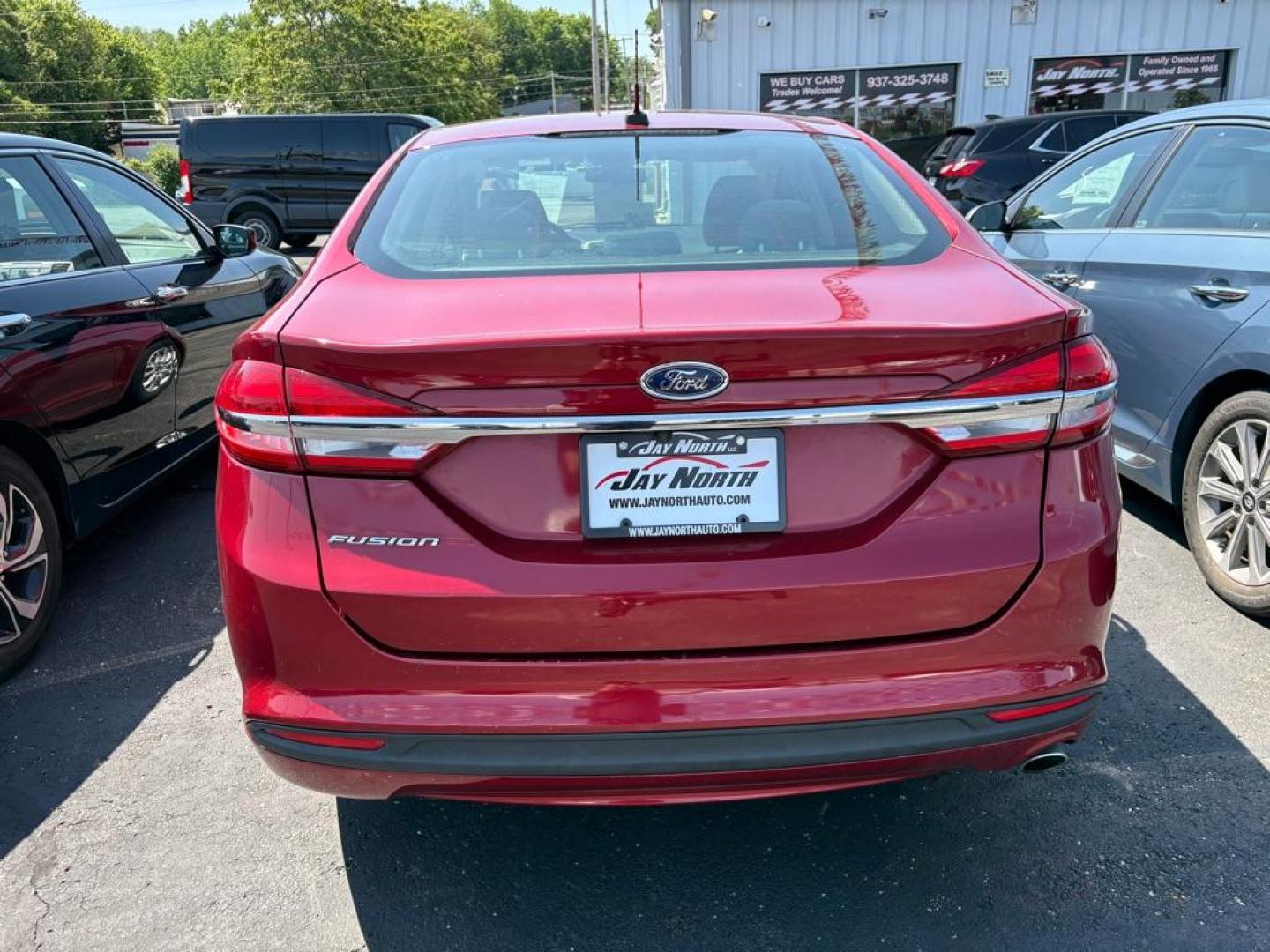 2017 RED FORD FUSION S (3FA6P0G73HR) with an 2.5L engine, Automatic transmission, located at 501 E. Columbia St., Springfield, OH, 45503, (800) 262-7122, 39.925262, -83.801796 - *** Low miles *** Tune Up *** New Front Brakes *** Oil Change *** New Battery *** New Cabin and Air filter*** Jay North Auto has offered hand picked vehicles since 1965! Our customer's enjoy a NO pressure buying experience with a small town feel. We are a preferred dealer for many local credit - Photo#2