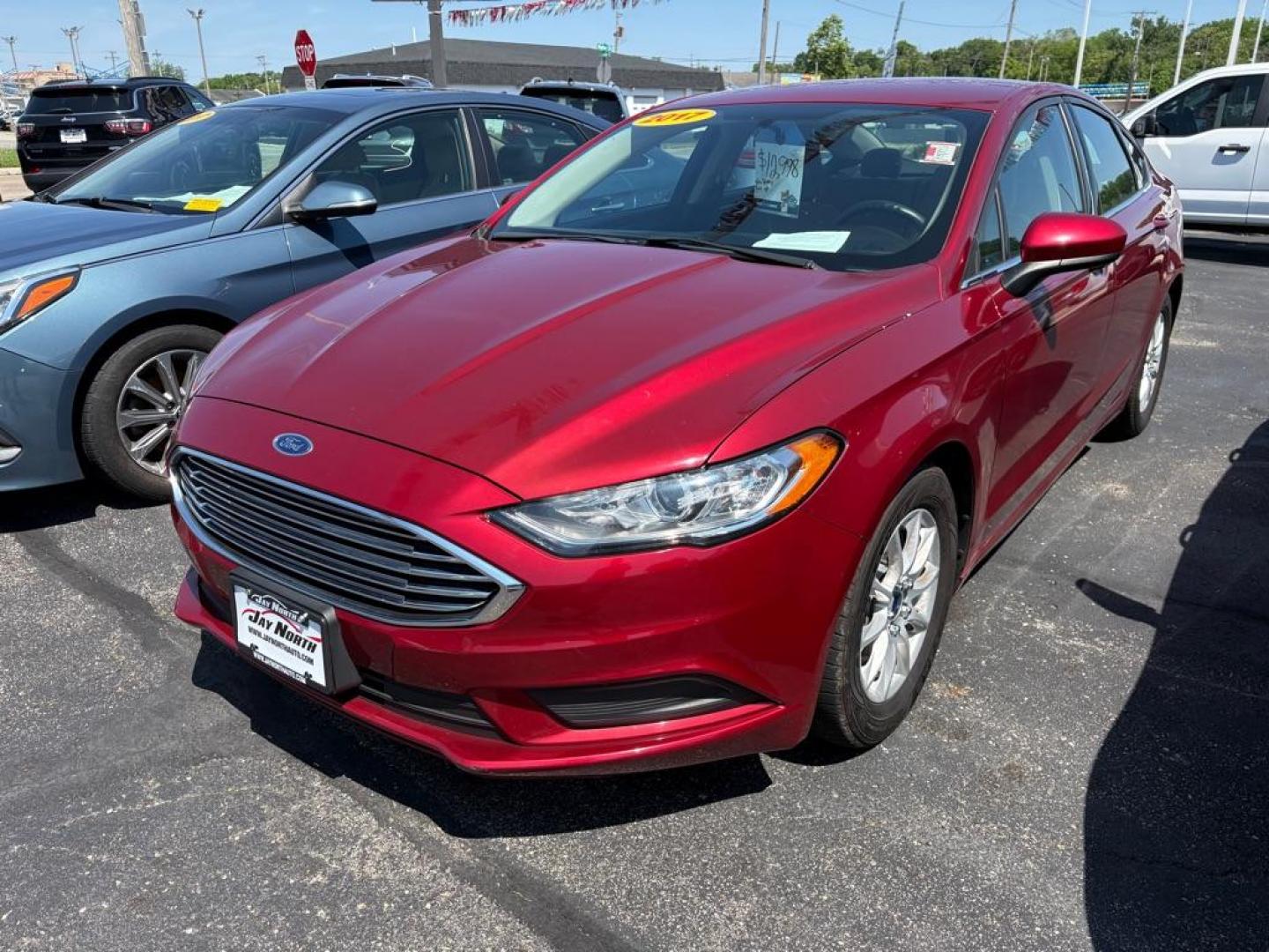 2017 RED FORD FUSION S (3FA6P0G73HR) with an 2.5L engine, Automatic transmission, located at 501 E. Columbia St., Springfield, OH, 45503, (800) 262-7122, 39.925262, -83.801796 - *** Low miles *** Tune Up *** New Front Brakes *** Oil Change *** New Battery *** New Cabin and Air filter*** Jay North Auto has offered hand picked vehicles since 1965! Our customer's enjoy a NO pressure buying experience with a small town feel. We are a preferred dealer for many local credit - Photo#4