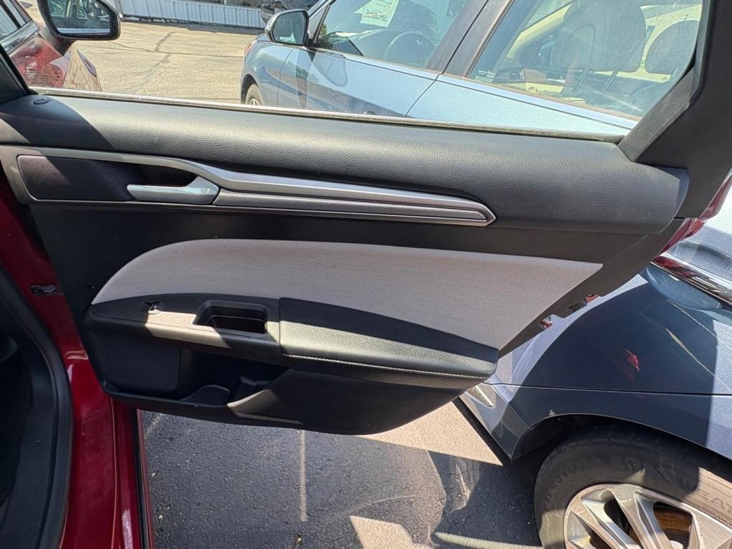 2017 RED FORD FUSION S (3FA6P0G73HR) with an 2.5L engine, Automatic transmission, located at 501 E. Columbia St., Springfield, OH, 45503, (800) 262-7122, 39.925262, -83.801796 - *** Low miles *** Tune Up *** New Front Brakes *** Oil Change *** New Battery *** New Cabin and Air filter*** Jay North Auto has offered hand picked vehicles since 1965! Our customer's enjoy a NO pressure buying experience with a small town feel. We are a preferred dealer for many local credit - Photo#12