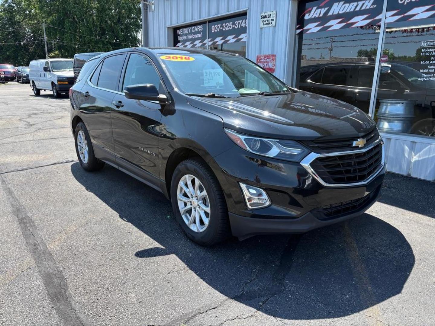 2018 BLACK CHEVROLET EQUINOX LT (2GNAXSEV2J6) with an 1.5L engine, Automatic transmission, located at 501 E. Columbia St., Springfield, OH, 45503, (800) 262-7122, 39.925262, -83.801796 - *** All Wheel Drive *** New Brakes *** New Cabin and Air filter *** Oil Change *** Inspection *** Back Up Camera *** 19 Service Records on CarFax *** Jay North Auto has offered hand picked vehicles since 1965! Our customer's enjoy a NO pressure buying experience with a small town feel. We ar - Photo#0