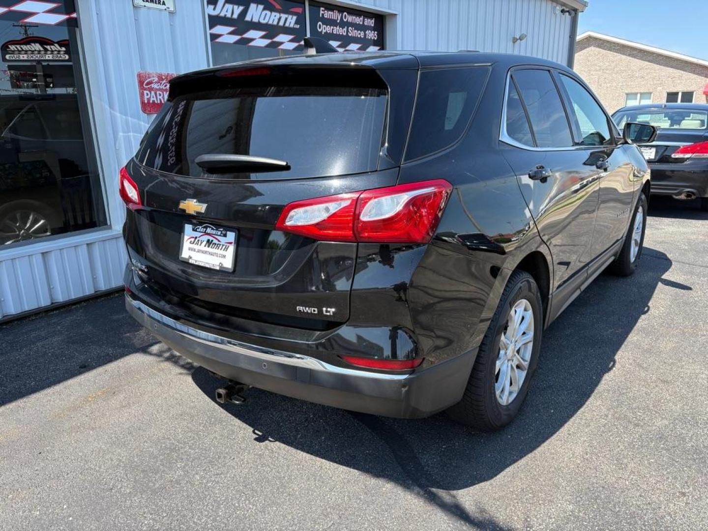 2018 BLACK CHEVROLET EQUINOX LT (2GNAXSEV2J6) with an 1.5L engine, Automatic transmission, located at 501 E. Columbia St., Springfield, OH, 45503, (800) 262-7122, 39.925262, -83.801796 - *** All Wheel Drive *** New Brakes *** New Cabin and Air filter *** Oil Change *** Inspection *** Back Up Camera *** 19 Service Records on CarFax *** Jay North Auto has offered hand picked vehicles since 1965! Our customer's enjoy a NO pressure buying experience with a small town feel. We ar - Photo#2