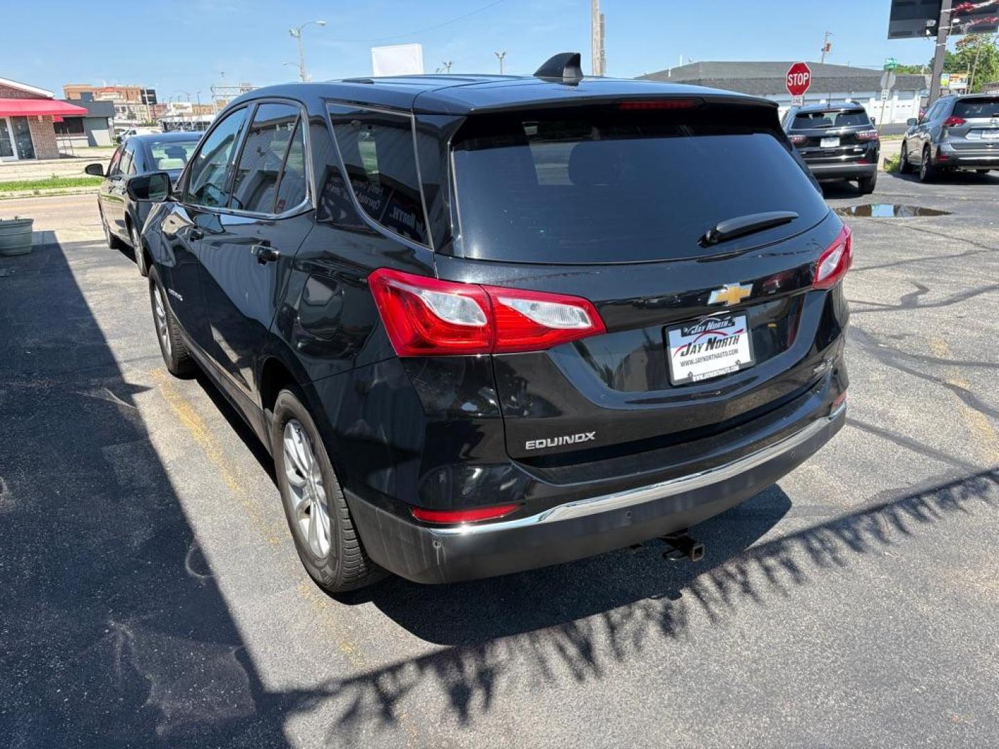 2018 BLACK CHEVROLET EQUINOX LT (2GNAXSEV2J6) with an 1.5L engine, Automatic transmission, located at 501 E. Columbia St., Springfield, OH, 45503, (800) 262-7122, 39.925262, -83.801796 - *** All Wheel Drive *** New Brakes *** New Cabin and Air filter *** Oil Change *** Inspection *** Back Up Camera *** 19 Service Records on CarFax *** Jay North Auto has offered hand picked vehicles since 1965! Our customer's enjoy a NO pressure buying experience with a small town feel. We ar - Photo#4
