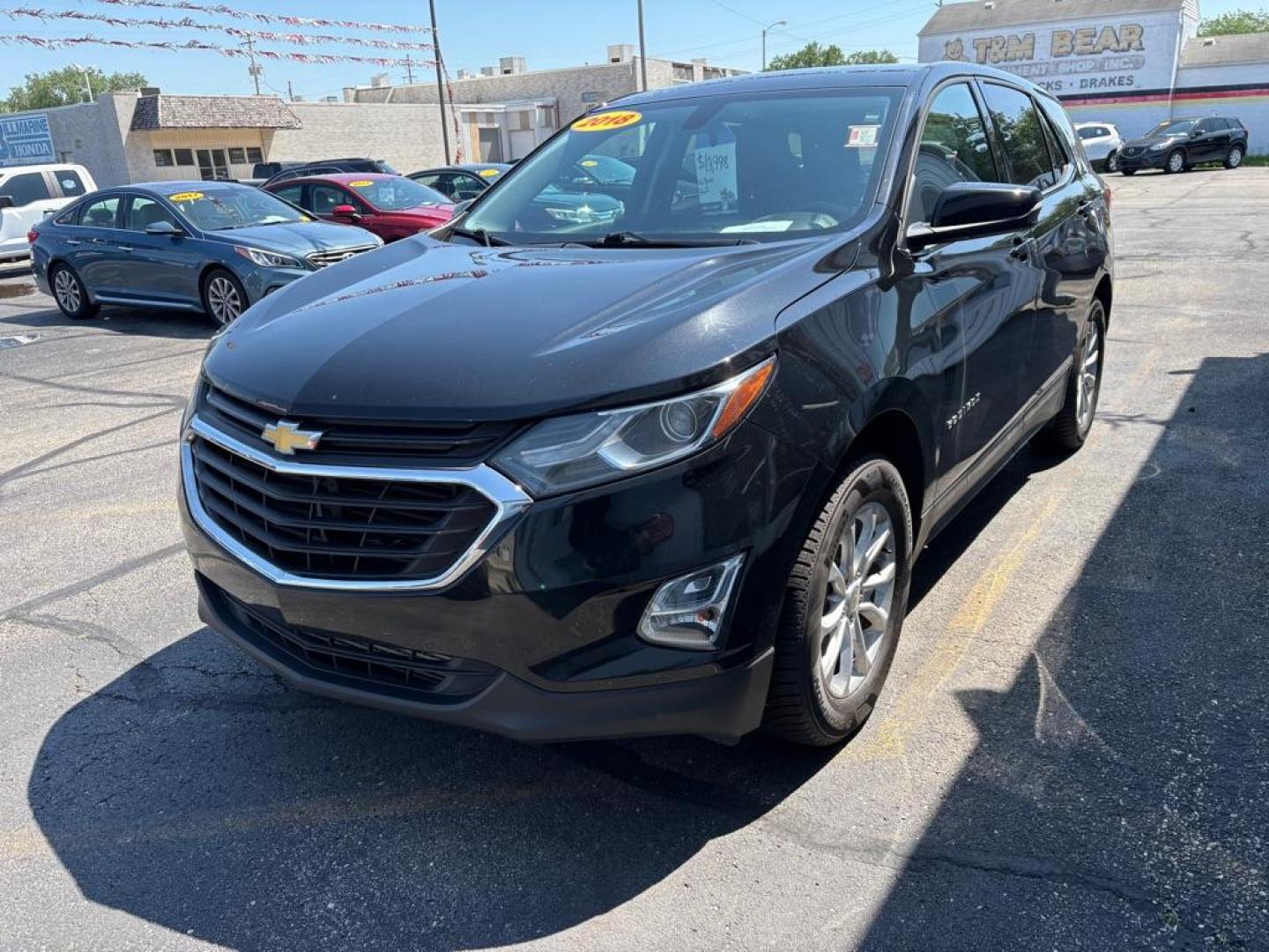 2018 BLACK CHEVROLET EQUINOX LT (2GNAXSEV2J6) with an 1.5L engine, Automatic transmission, located at 501 E. Columbia St., Springfield, OH, 45503, (800) 262-7122, 39.925262, -83.801796 - *** All Wheel Drive *** New Brakes *** New Cabin and Air filter *** Oil Change *** Inspection *** Back Up Camera *** 19 Service Records on CarFax *** Jay North Auto has offered hand picked vehicles since 1965! Our customer's enjoy a NO pressure buying experience with a small town feel. We ar - Photo#5