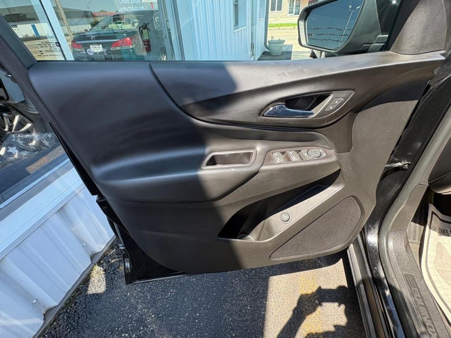 2018 BLACK CHEVROLET EQUINOX LT (2GNAXSEV2J6) with an 1.5L engine, Automatic transmission, located at 501 E. Columbia St., Springfield, OH, 45503, (800) 262-7122, 39.925262, -83.801796 - *** All Wheel Drive *** New Brakes *** New Cabin and Air filter *** Oil Change *** Inspection *** Back Up Camera *** 19 Service Records on CarFax *** Jay North Auto has offered hand picked vehicles since 1965! Our customer's enjoy a NO pressure buying experience with a small town feel. We ar - Photo#7