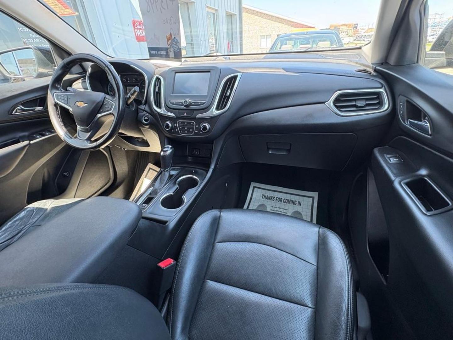 2018 BLACK CHEVROLET EQUINOX LT (2GNAXSEV2J6) with an 1.5L engine, Automatic transmission, located at 501 E. Columbia St., Springfield, OH, 45503, (800) 262-7122, 39.925262, -83.801796 - *** All Wheel Drive *** New Brakes *** New Cabin and Air filter *** Oil Change *** Inspection *** Back Up Camera *** 19 Service Records on CarFax *** Jay North Auto has offered hand picked vehicles since 1965! Our customer's enjoy a NO pressure buying experience with a small town feel. We ar - Photo#17