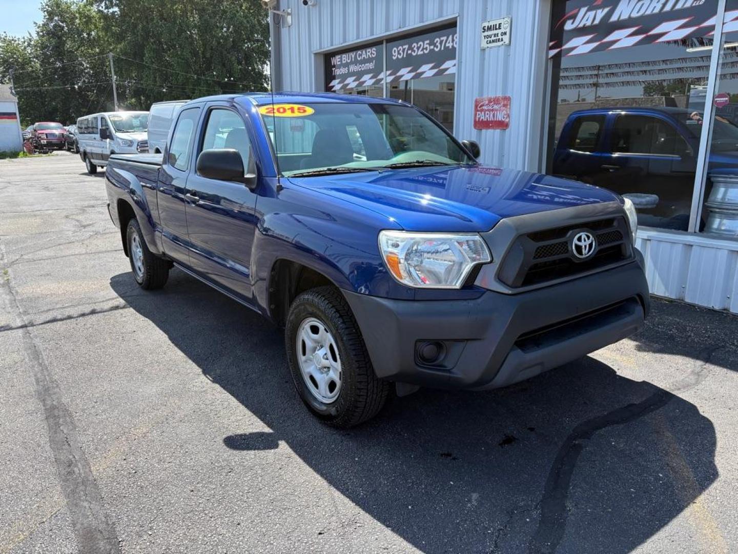 2015 BLUE TOYOTA TACOMA ACCESS CAB (5TFTX4CNXFX) with an 2.7L engine, Automatic transmission, located at 501 E. Columbia St., Springfield, OH, 45503, (800) 262-7122, 39.925262, -83.801796 - ***Clean Carfax***Access Cab***SUPER CLEAN***Like New Tires and Brakes***New Air Filter and Cabin Filter***Fresh Oil Change*** Jay North Auto has offered hand picked vehicles since 1965! Our customer's enjoy a NO pressure buying experience with a small town feel. We are a preferred dealer for- Photo#0