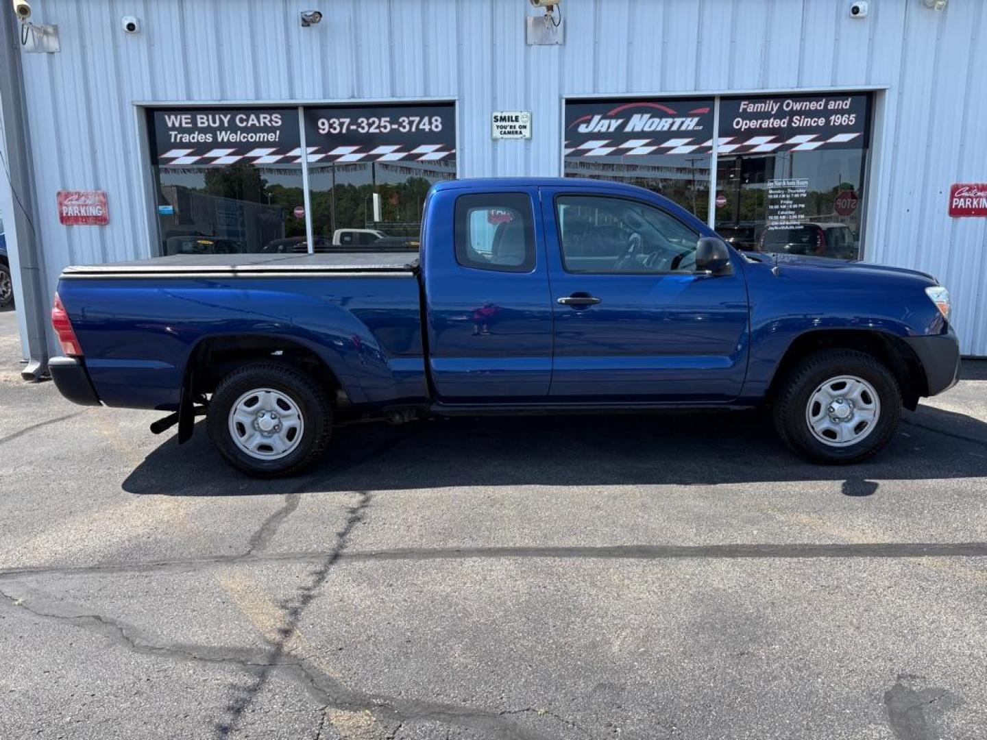 2015 BLUE TOYOTA TACOMA ACCESS CAB (5TFTX4CNXFX) with an 2.7L engine, Automatic transmission, located at 501 E. Columbia St., Springfield, OH, 45503, (800) 262-7122, 39.925262, -83.801796 - ***Clean Carfax***Access Cab***SUPER CLEAN***Like New Tires and Brakes***New Air Filter and Cabin Filter***Fresh Oil Change*** Jay North Auto has offered hand picked vehicles since 1965! Our customer's enjoy a NO pressure buying experience with a small town feel. We are a preferred dealer for- Photo#1
