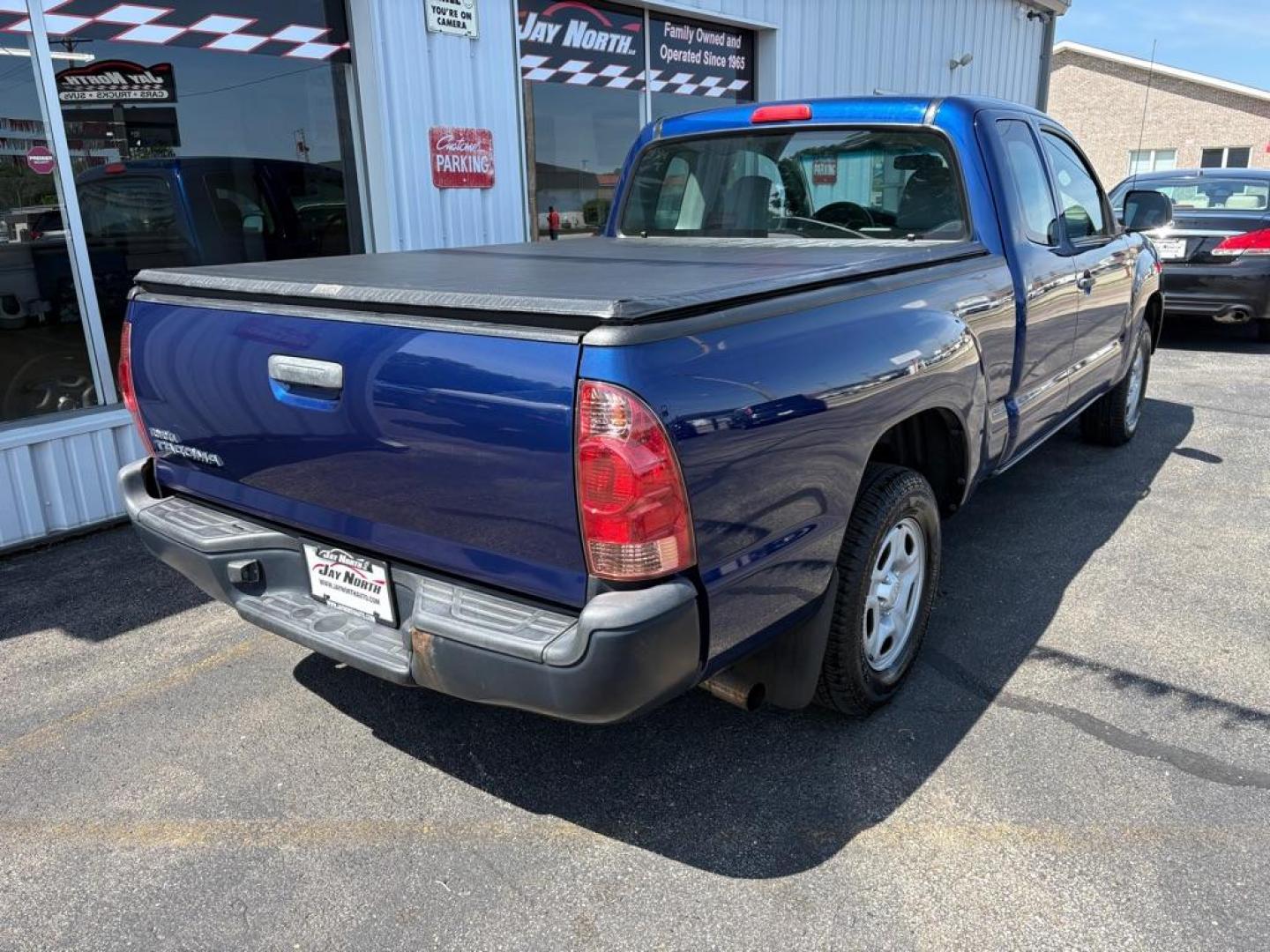 2015 BLUE TOYOTA TACOMA ACCESS CAB (5TFTX4CNXFX) with an 2.7L engine, Automatic transmission, located at 501 E. Columbia St., Springfield, OH, 45503, (800) 262-7122, 39.925262, -83.801796 - ***Clean Carfax***Access Cab***SUPER CLEAN***Like New Tires and Brakes***New Air Filter and Cabin Filter***Fresh Oil Change*** Jay North Auto has offered hand picked vehicles since 1965! Our customer's enjoy a NO pressure buying experience with a small town feel. We are a preferred dealer for- Photo#2