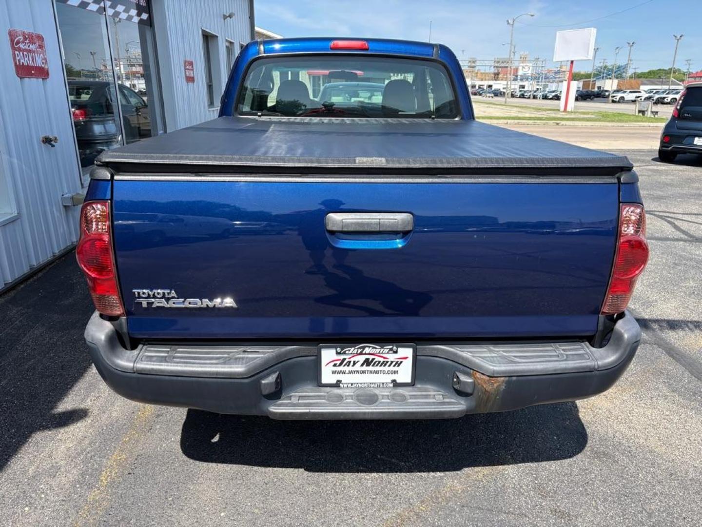 2015 BLUE TOYOTA TACOMA ACCESS CAB (5TFTX4CNXFX) with an 2.7L engine, Automatic transmission, located at 501 E. Columbia St., Springfield, OH, 45503, (800) 262-7122, 39.925262, -83.801796 - ***Clean Carfax***Access Cab***SUPER CLEAN***Like New Tires and Brakes***New Air Filter and Cabin Filter***Fresh Oil Change*** Jay North Auto has offered hand picked vehicles since 1965! Our customer's enjoy a NO pressure buying experience with a small town feel. We are a preferred dealer for- Photo#3