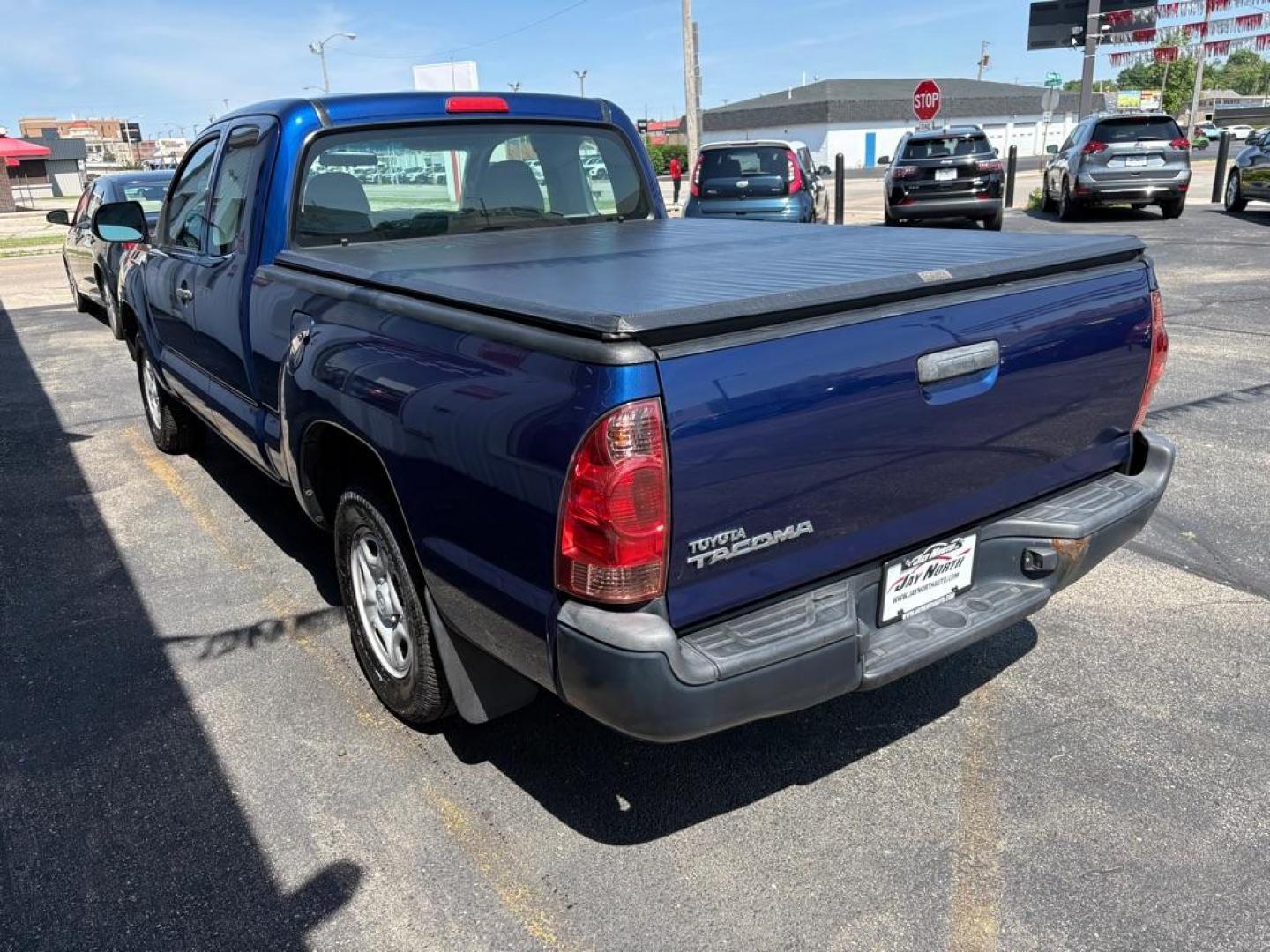 2015 BLUE TOYOTA TACOMA ACCESS CAB (5TFTX4CNXFX) with an 2.7L engine, Automatic transmission, located at 501 E. Columbia St., Springfield, OH, 45503, (800) 262-7122, 39.925262, -83.801796 - ***Clean Carfax***Access Cab***SUPER CLEAN***Like New Tires and Brakes***New Air Filter and Cabin Filter***Fresh Oil Change*** Jay North Auto has offered hand picked vehicles since 1965! Our customer's enjoy a NO pressure buying experience with a small town feel. We are a preferred dealer for- Photo#4