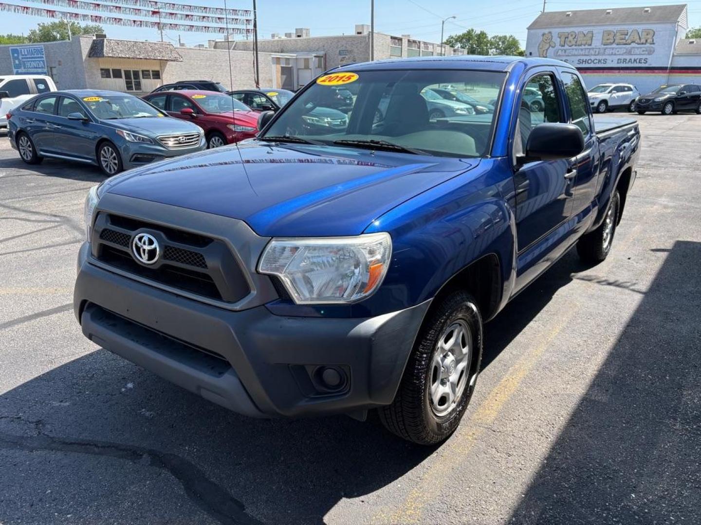 2015 BLUE TOYOTA TACOMA ACCESS CAB (5TFTX4CNXFX) with an 2.7L engine, Automatic transmission, located at 501 E. Columbia St., Springfield, OH, 45503, (800) 262-7122, 39.925262, -83.801796 - ***Clean Carfax***Access Cab***SUPER CLEAN***Like New Tires and Brakes***New Air Filter and Cabin Filter***Fresh Oil Change*** Jay North Auto has offered hand picked vehicles since 1965! Our customer's enjoy a NO pressure buying experience with a small town feel. We are a preferred dealer for- Photo#5