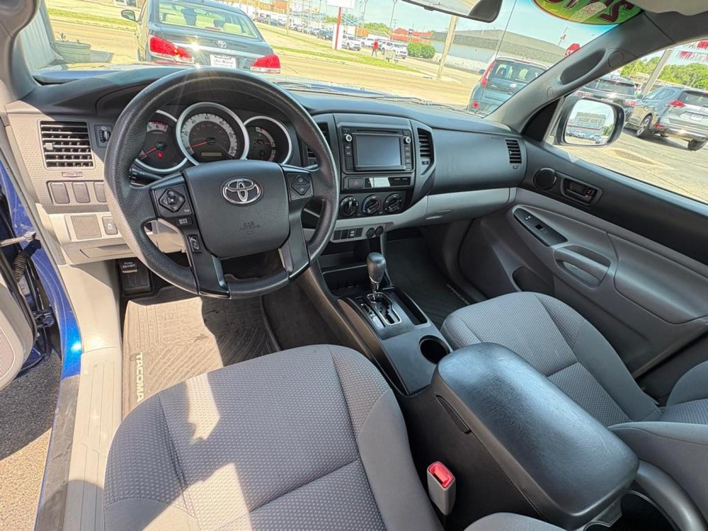 2015 BLUE TOYOTA TACOMA ACCESS CAB (5TFTX4CNXFX) with an 2.7L engine, Automatic transmission, located at 501 E. Columbia St., Springfield, OH, 45503, (800) 262-7122, 39.925262, -83.801796 - ***Clean Carfax***Access Cab***SUPER CLEAN***Like New Tires and Brakes***New Air Filter and Cabin Filter***Fresh Oil Change*** Jay North Auto has offered hand picked vehicles since 1965! Our customer's enjoy a NO pressure buying experience with a small town feel. We are a preferred dealer for- Photo#9