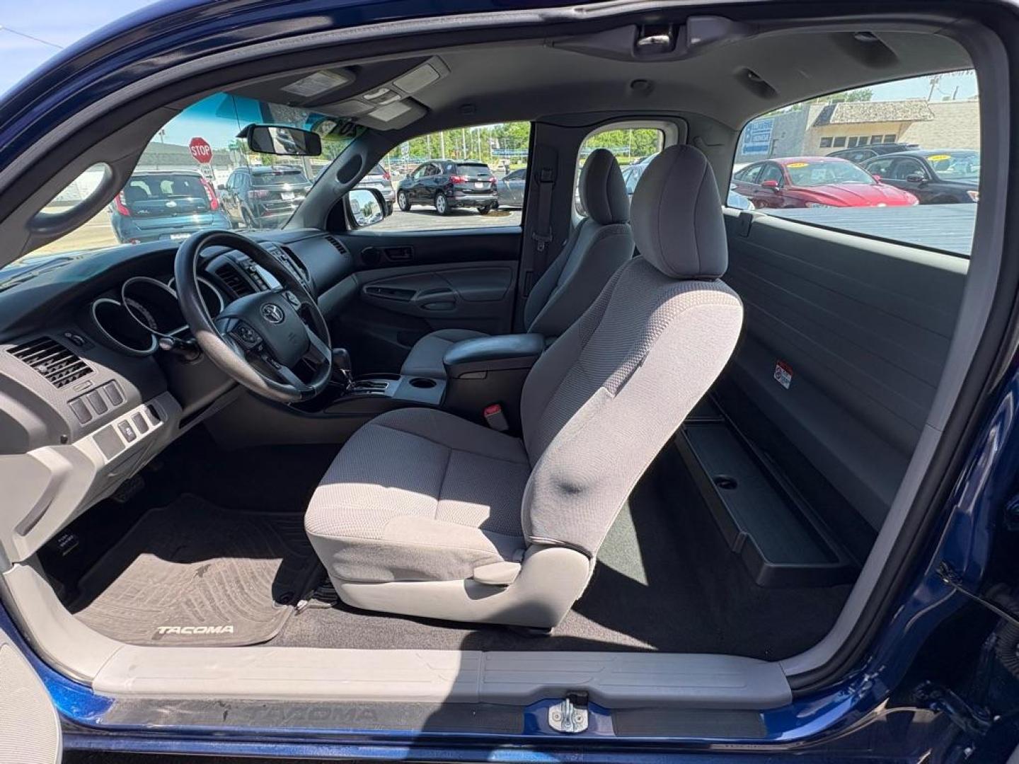 2015 BLUE TOYOTA TACOMA ACCESS CAB (5TFTX4CNXFX) with an 2.7L engine, Automatic transmission, located at 501 E. Columbia St., Springfield, OH, 45503, (800) 262-7122, 39.925262, -83.801796 - ***Clean Carfax***Access Cab***SUPER CLEAN***Like New Tires and Brakes***New Air Filter and Cabin Filter***Fresh Oil Change*** Jay North Auto has offered hand picked vehicles since 1965! Our customer's enjoy a NO pressure buying experience with a small town feel. We are a preferred dealer for- Photo#11
