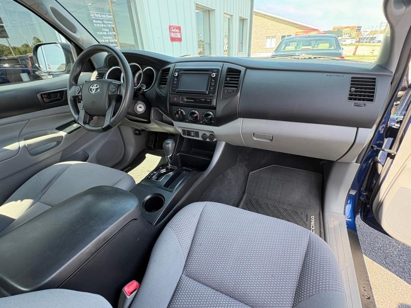 2015 BLUE TOYOTA TACOMA ACCESS CAB (5TFTX4CNXFX) with an 2.7L engine, Automatic transmission, located at 501 E. Columbia St., Springfield, OH, 45503, (800) 262-7122, 39.925262, -83.801796 - ***Clean Carfax***Access Cab***SUPER CLEAN***Like New Tires and Brakes***New Air Filter and Cabin Filter***Fresh Oil Change*** Jay North Auto has offered hand picked vehicles since 1965! Our customer's enjoy a NO pressure buying experience with a small town feel. We are a preferred dealer for- Photo#16