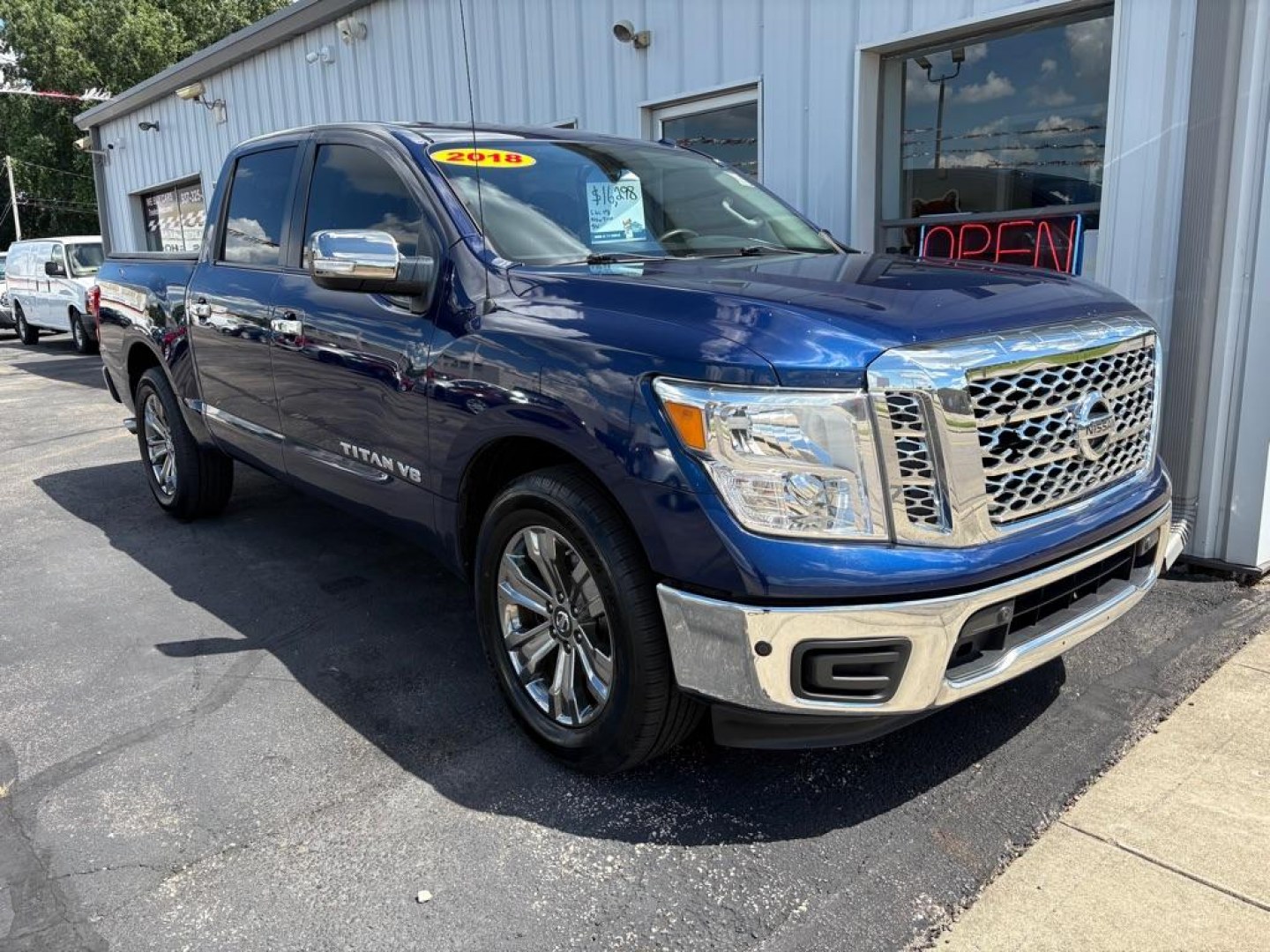 2018 BLUE NISSAN TITAN SV CREW CAB (1N6AA1E63JN) with an 5.6L engine, Automatic transmission, located at 501 E. Columbia St., Springfield, OH, 45503, (800) 262-7122, 39.925262, -83.801796 - *** New Tires *** New Brakes *** New Wipers *** New Cabin and Air filter *** New Outer Tie rods *** Inspection *** Oil Change *** 5.6L V8 *** Crew Cab *** 25 Service Records on CarFax *** SV *** Power Rear Sliding Window *** Blind Spot *** Parking Sensors *** Power Seat *** $43k New *** Jay Nort- Photo#0
