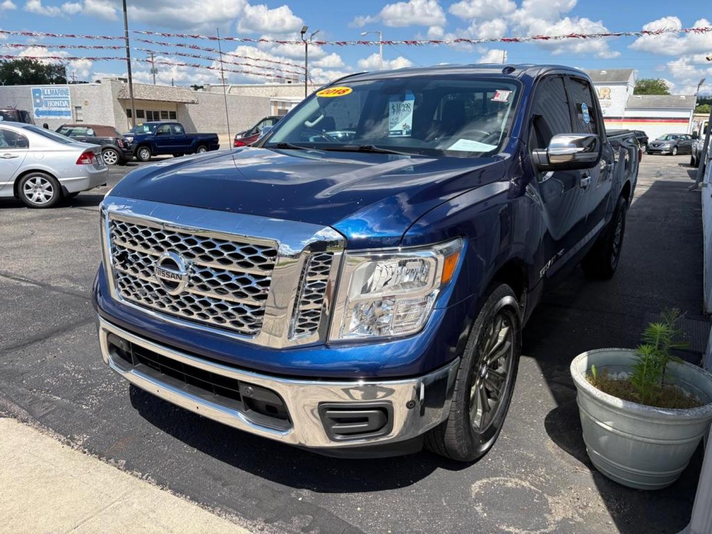 2018 BLUE NISSAN TITAN SV CREW CAB (1N6AA1E63JN) with an 5.6L engine, Automatic transmission, located at 501 E. Columbia St., Springfield, OH, 45503, (800) 262-7122, 39.925262, -83.801796 - *** New Tires *** New Brakes *** New Wipers *** New Cabin and Air filter *** New Outer Tie rods *** Inspection *** Oil Change *** 5.6L V8 *** Crew Cab *** 25 Service Records on CarFax *** SV *** Power Rear Sliding Window *** Blind Spot *** Parking Sensors *** Power Seat *** $43k New *** Jay Nort- Photo#5