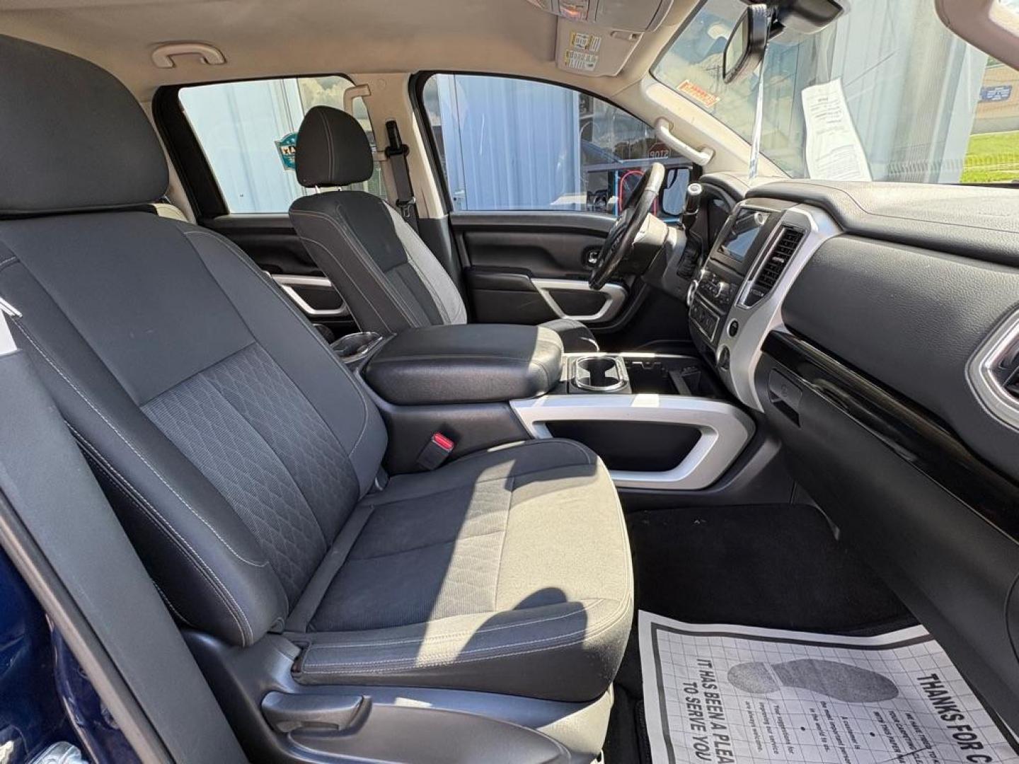 2018 BLUE NISSAN TITAN SV CREW CAB (1N6AA1E63JN) with an 5.6L engine, Automatic transmission, located at 501 E. Columbia St., Springfield, OH, 45503, (800) 262-7122, 39.925262, -83.801796 - *** New Tires *** New Brakes *** New Wipers *** New Cabin and Air filter *** New Outer Tie rods *** Inspection *** Oil Change *** 5.6L V8 *** Crew Cab *** 25 Service Records on CarFax *** SV *** Power Rear Sliding Window *** Blind Spot *** Parking Sensors *** Power Seat *** $43k New *** Jay Nort- Photo#17