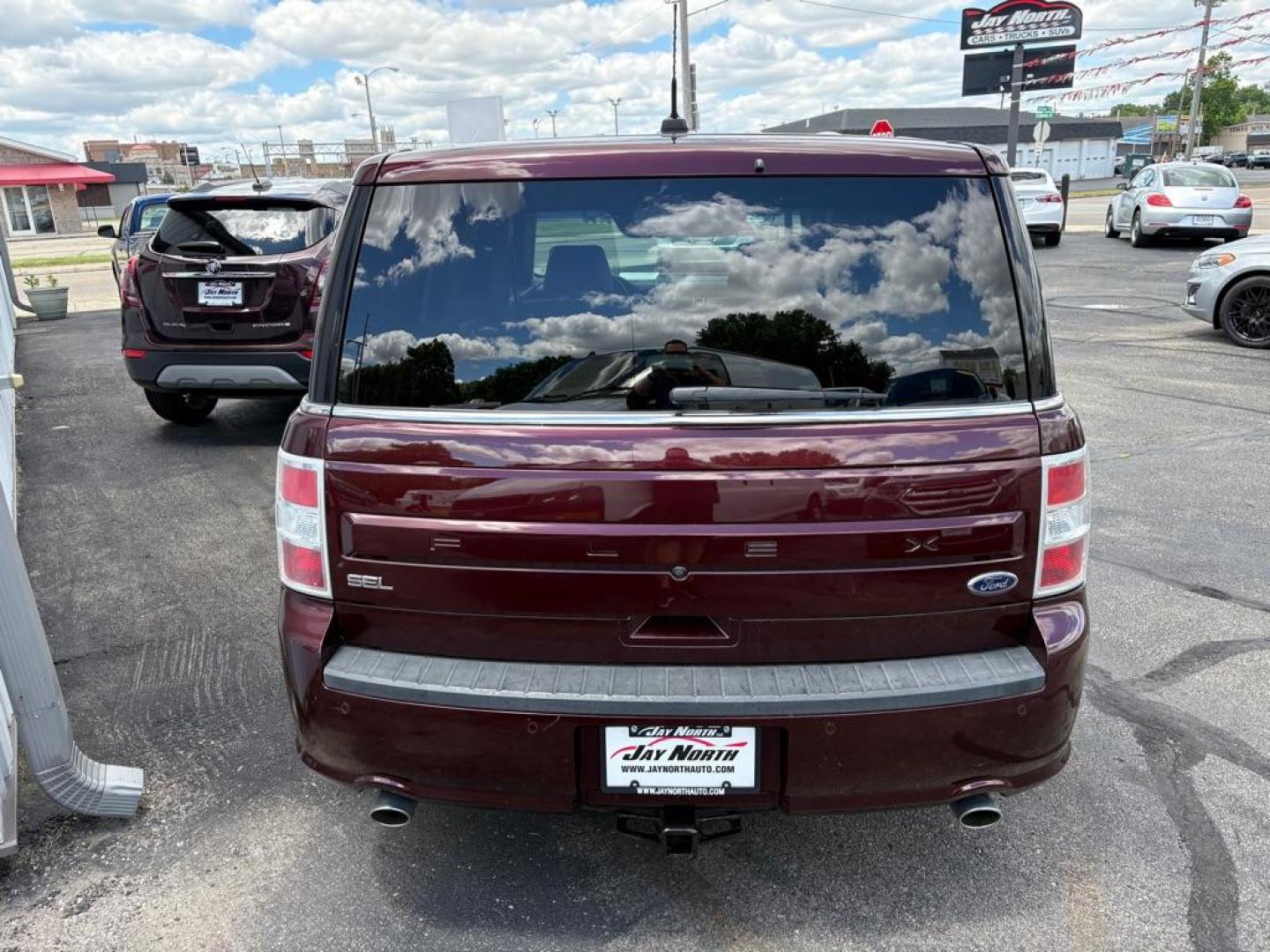 2018 MAROON FORD FLEX SEL (2FMGK5C84JB) with an 3.5L engine, Automatic transmission, located at 501 E. Columbia St., Springfield, OH, 45503, (800) 262-7122, 39.925262, -83.801796 - ***Clean Carfax***SEL***3.5L***Heated Leather Seating***3rd Row Seating***Blind Spot***Premium Audio***Remote Start***All New Brake Pads and Rotors***New Tires***Fresh Oil Change*** Jay North Auto has offered hand picked vehicles since 1965! Our customer's enjoy a NO pressure buying experience- Photo#3