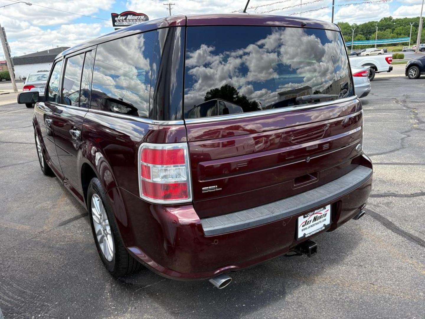 2018 MAROON FORD FLEX SEL (2FMGK5C84JB) with an 3.5L engine, Automatic transmission, located at 501 E. Columbia St., Springfield, OH, 45503, (800) 262-7122, 39.925262, -83.801796 - ***Clean Carfax***SEL***3.5L***Heated Leather Seating***3rd Row Seating***Blind Spot***Premium Audio***Remote Start***All New Brake Pads and Rotors***New Tires***Fresh Oil Change*** Jay North Auto has offered hand picked vehicles since 1965! Our customer's enjoy a NO pressure buying experience- Photo#4
