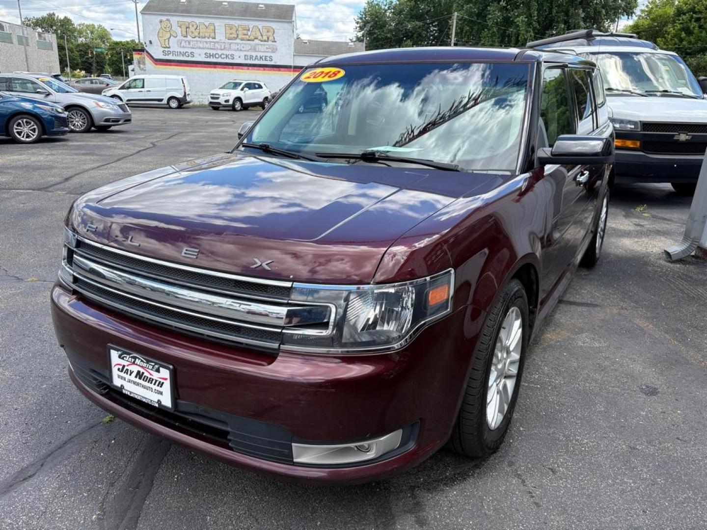 2018 MAROON FORD FLEX SEL (2FMGK5C84JB) with an 3.5L engine, Automatic transmission, located at 501 E. Columbia St., Springfield, OH, 45503, (800) 262-7122, 39.925262, -83.801796 - ***Clean Carfax***SEL***3.5L***Heated Leather Seating***3rd Row Seating***Blind Spot***Premium Audio***Remote Start***All New Brake Pads and Rotors***New Tires***Fresh Oil Change*** Jay North Auto has offered hand picked vehicles since 1965! Our customer's enjoy a NO pressure buying experience- Photo#5