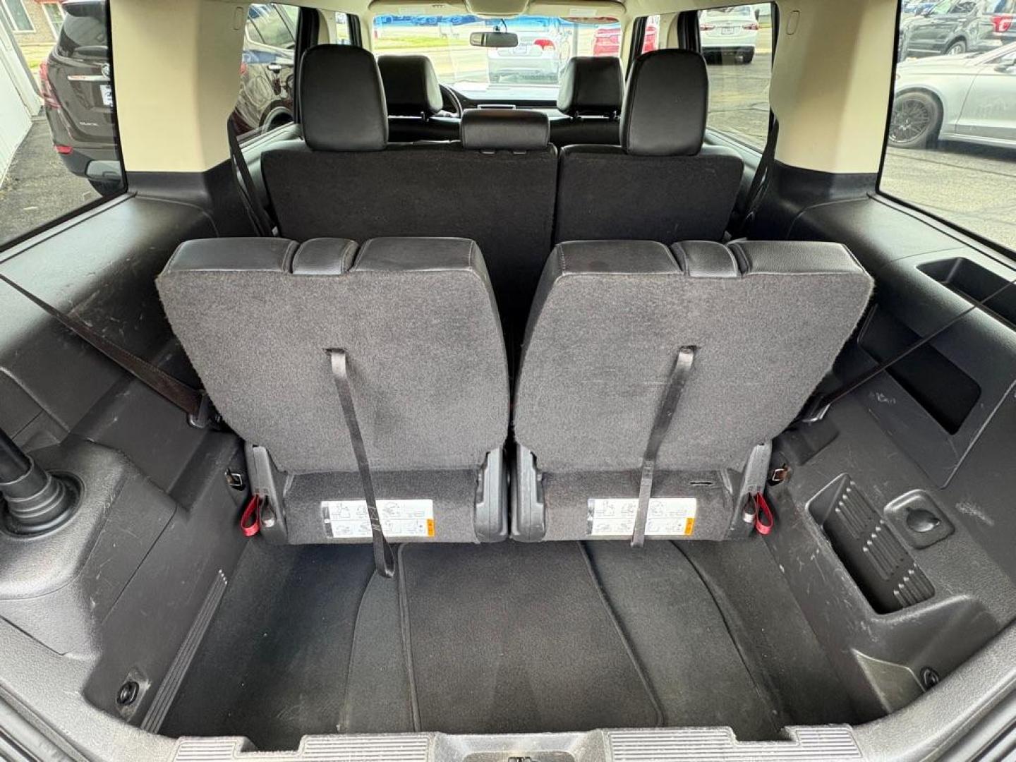 2018 MAROON FORD FLEX SEL (2FMGK5C84JB) with an 3.5L engine, Automatic transmission, located at 501 E. Columbia St., Springfield, OH, 45503, (800) 262-7122, 39.925262, -83.801796 - ***Clean Carfax***SEL***3.5L***Heated Leather Seating***3rd Row Seating***Blind Spot***Premium Audio***Remote Start***All New Brake Pads and Rotors***New Tires***Fresh Oil Change*** Jay North Auto has offered hand picked vehicles since 1965! Our customer's enjoy a NO pressure buying experience- Photo#13