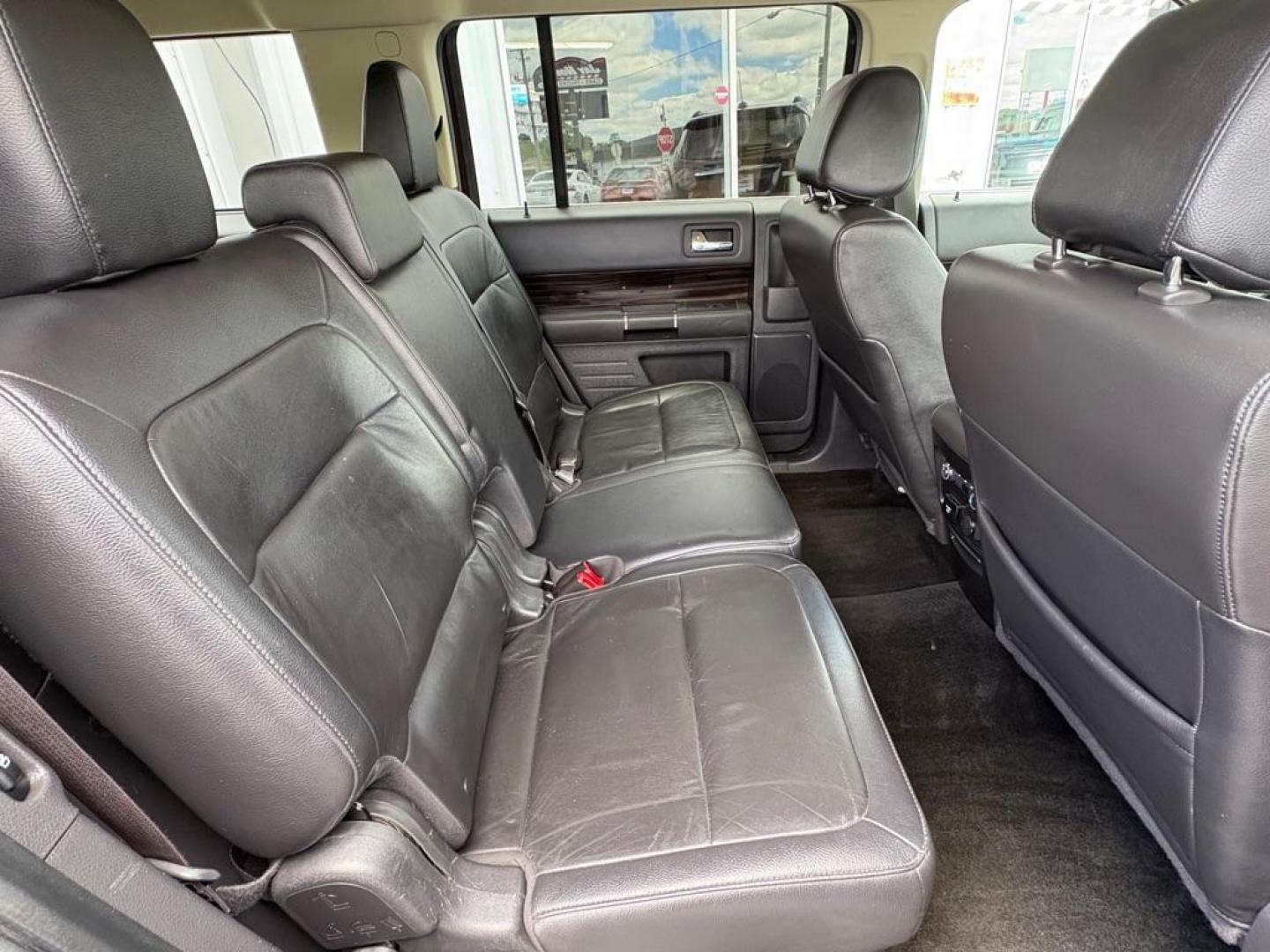 2018 MAROON FORD FLEX SEL (2FMGK5C84JB) with an 3.5L engine, Automatic transmission, located at 501 E. Columbia St., Springfield, OH, 45503, (800) 262-7122, 39.925262, -83.801796 - ***Clean Carfax***SEL***3.5L***Heated Leather Seating***3rd Row Seating***Blind Spot***Premium Audio***Remote Start***All New Brake Pads and Rotors***New Tires***Fresh Oil Change*** Jay North Auto has offered hand picked vehicles since 1965! Our customer's enjoy a NO pressure buying experience- Photo#16