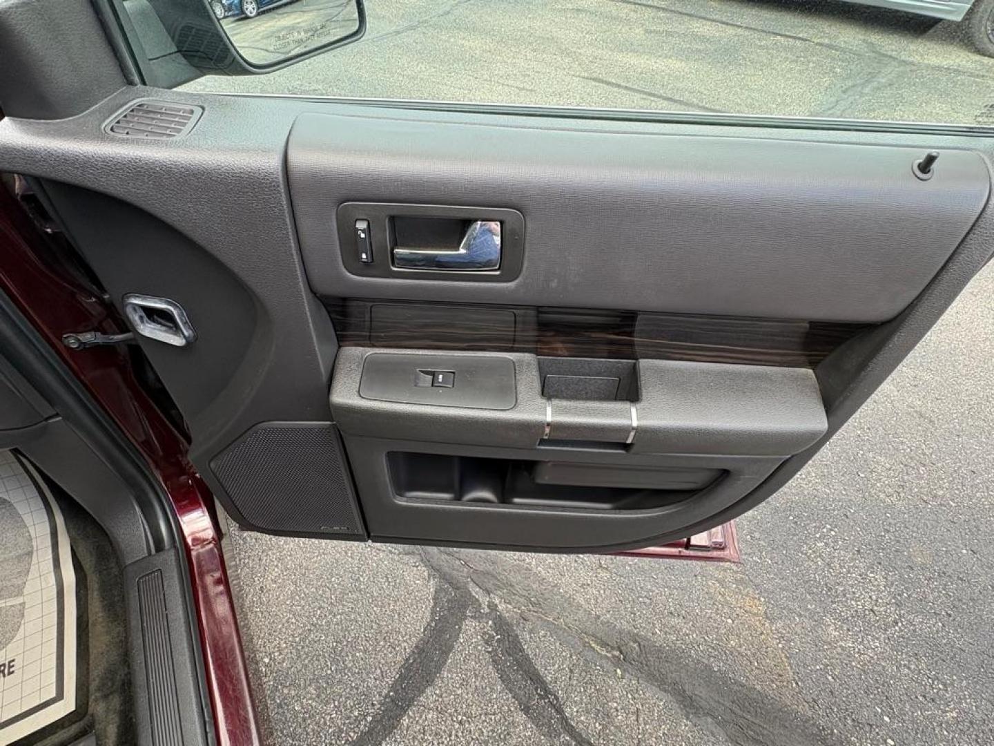 2018 MAROON FORD FLEX SEL (2FMGK5C84JB) with an 3.5L engine, Automatic transmission, located at 501 E. Columbia St., Springfield, OH, 45503, (800) 262-7122, 39.925262, -83.801796 - ***Clean Carfax***SEL***3.5L***Heated Leather Seating***3rd Row Seating***Blind Spot***Premium Audio***Remote Start***All New Brake Pads and Rotors***New Tires***Fresh Oil Change*** Jay North Auto has offered hand picked vehicles since 1965! Our customer's enjoy a NO pressure buying experience- Photo#17