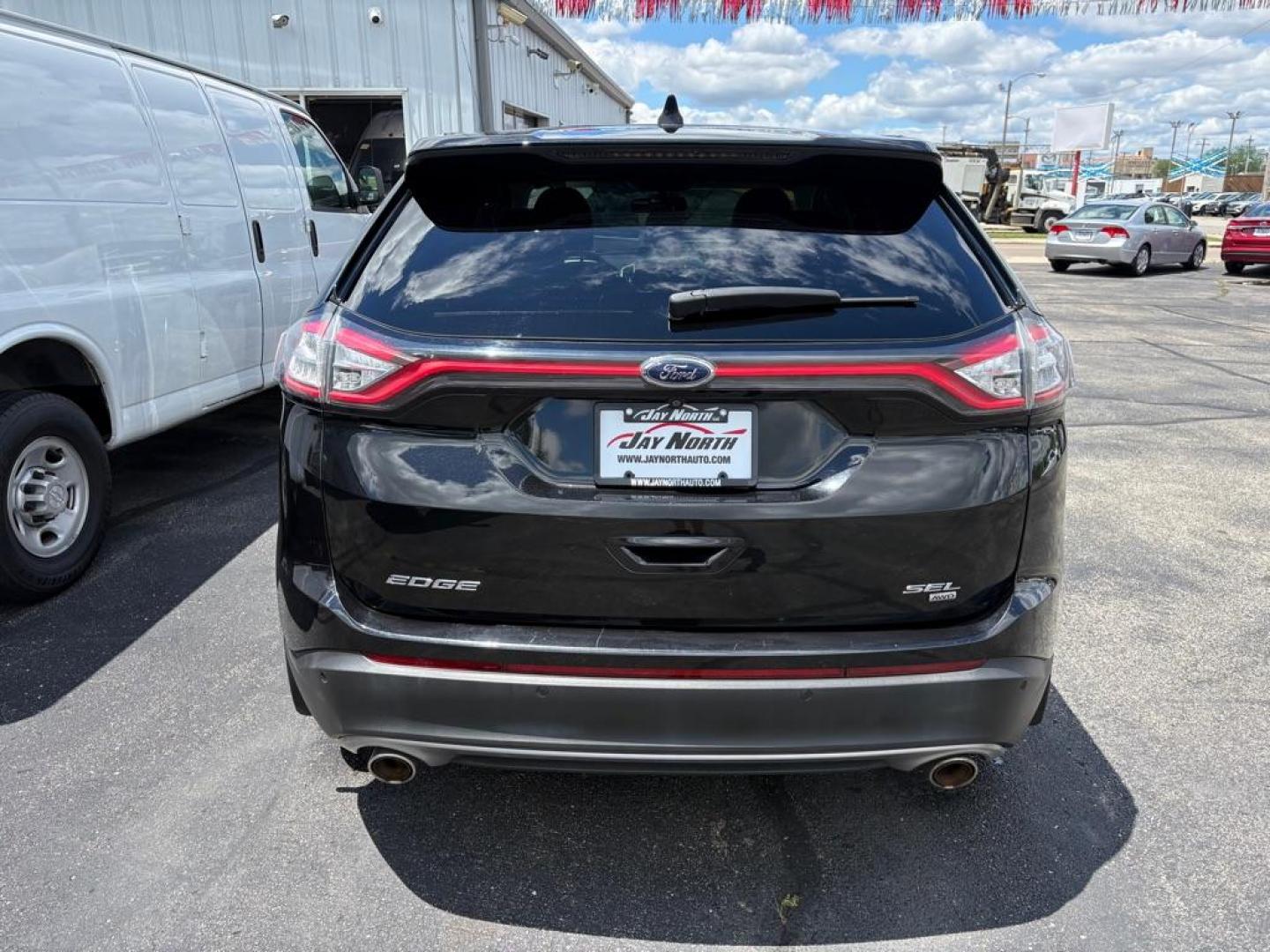 2015 BLACK FORD EDGE SEL (2FMTK4J86FB) with an 3.5L engine, Automatic transmission, located at 501 E. Columbia St., Springfield, OH, 45503, (800) 262-7122, 39.925262, -83.801796 - ***Only 79K Miles***SEL***AWD***Navigation***Blind Spot***Remote Start***Heated Leather Seating***Hands Free Lift Gate***New Tires***All New Brake Pads and Rotors***Fresh Oil Change***NICE*** Jay North Auto has offered hand picked vehicles since 1965! Our customer's enjoy a NO pressure buying e - Photo#3