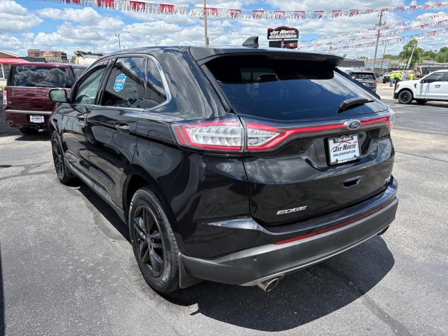 2015 BLACK FORD EDGE SEL (2FMTK4J86FB) with an 3.5L engine, Automatic transmission, located at 501 E. Columbia St., Springfield, OH, 45503, (800) 262-7122, 39.925262, -83.801796 - ***Only 79K Miles***SEL***AWD***Navigation***Blind Spot***Remote Start***Heated Leather Seating***Hands Free Lift Gate***New Tires***All New Brake Pads and Rotors***Fresh Oil Change***NICE*** Jay North Auto has offered hand picked vehicles since 1965! Our customer's enjoy a NO pressure buying e - Photo#4