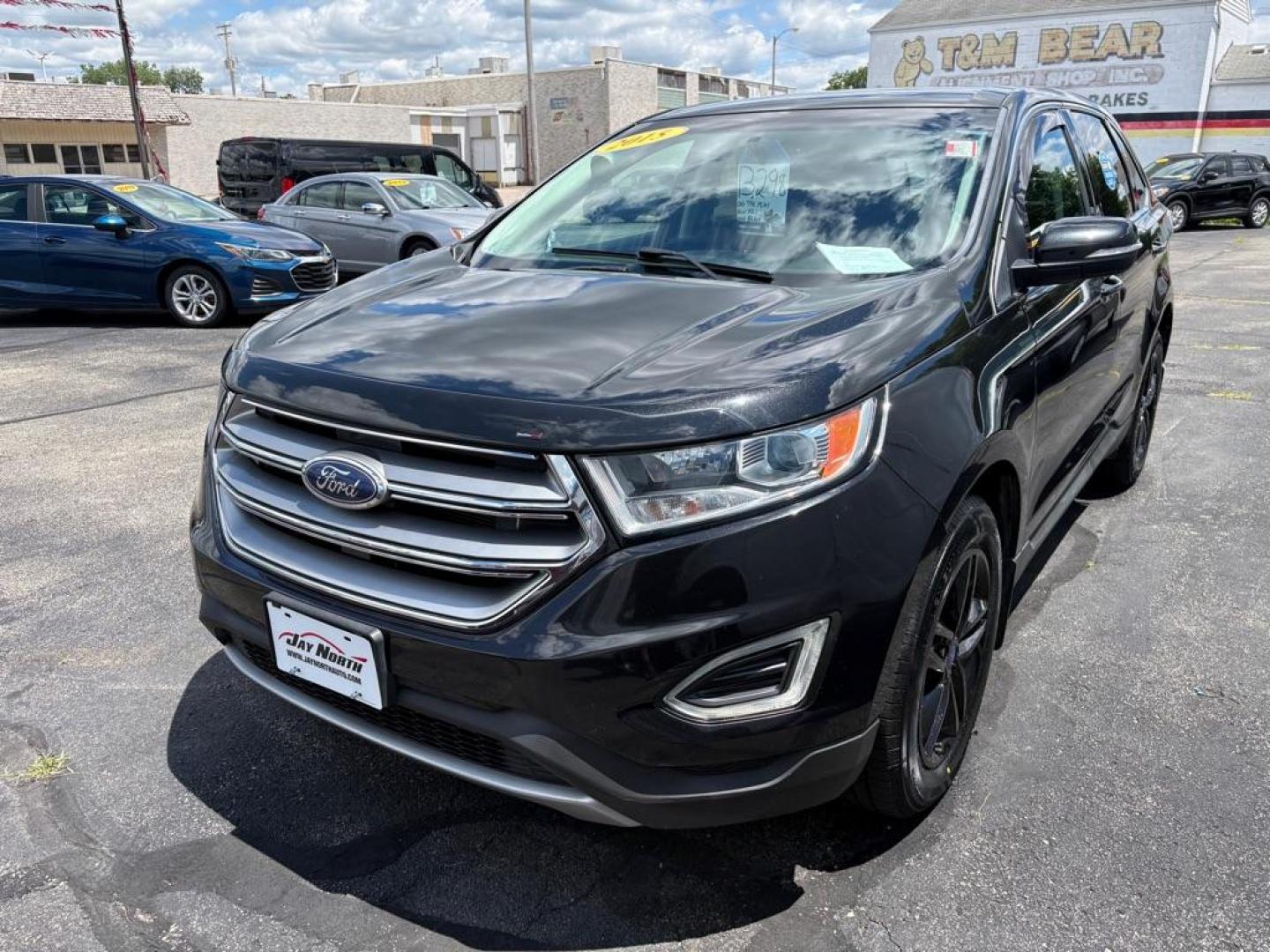 2015 BLACK FORD EDGE SEL (2FMTK4J86FB) with an 3.5L engine, Automatic transmission, located at 501 E. Columbia St., Springfield, OH, 45503, (800) 262-7122, 39.925262, -83.801796 - ***Only 79K Miles***SEL***AWD***Navigation***Blind Spot***Remote Start***Heated Leather Seating***Hands Free Lift Gate***New Tires***All New Brake Pads and Rotors***Fresh Oil Change***NICE*** Jay North Auto has offered hand picked vehicles since 1965! Our customer's enjoy a NO pressure buying e - Photo#5