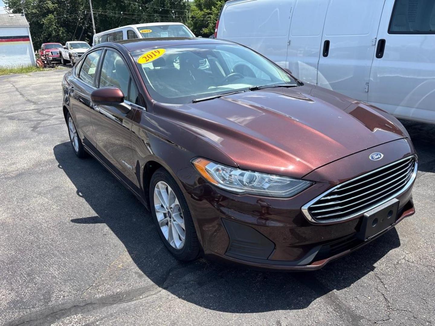 2019 RED FORD FUSION SE HYBRID (3FA6P0LUXKR) with an 2.0L engine, Continuously Variable transmission, located at 501 E. Columbia St., Springfield, OH, 45503, (800) 262-7122, 39.925262, -83.801796 - *** New Tires *** New Brakes *** New Cabin and Air filter *** Oil Change *** Inspection *** Hybrid *** Jay North Auto has offered hand picked vehicles since 1965! Our customer's enjoy a NO pressure buying experience with a small town feel. We are a preferred dealer for many local credit unions- Photo#0