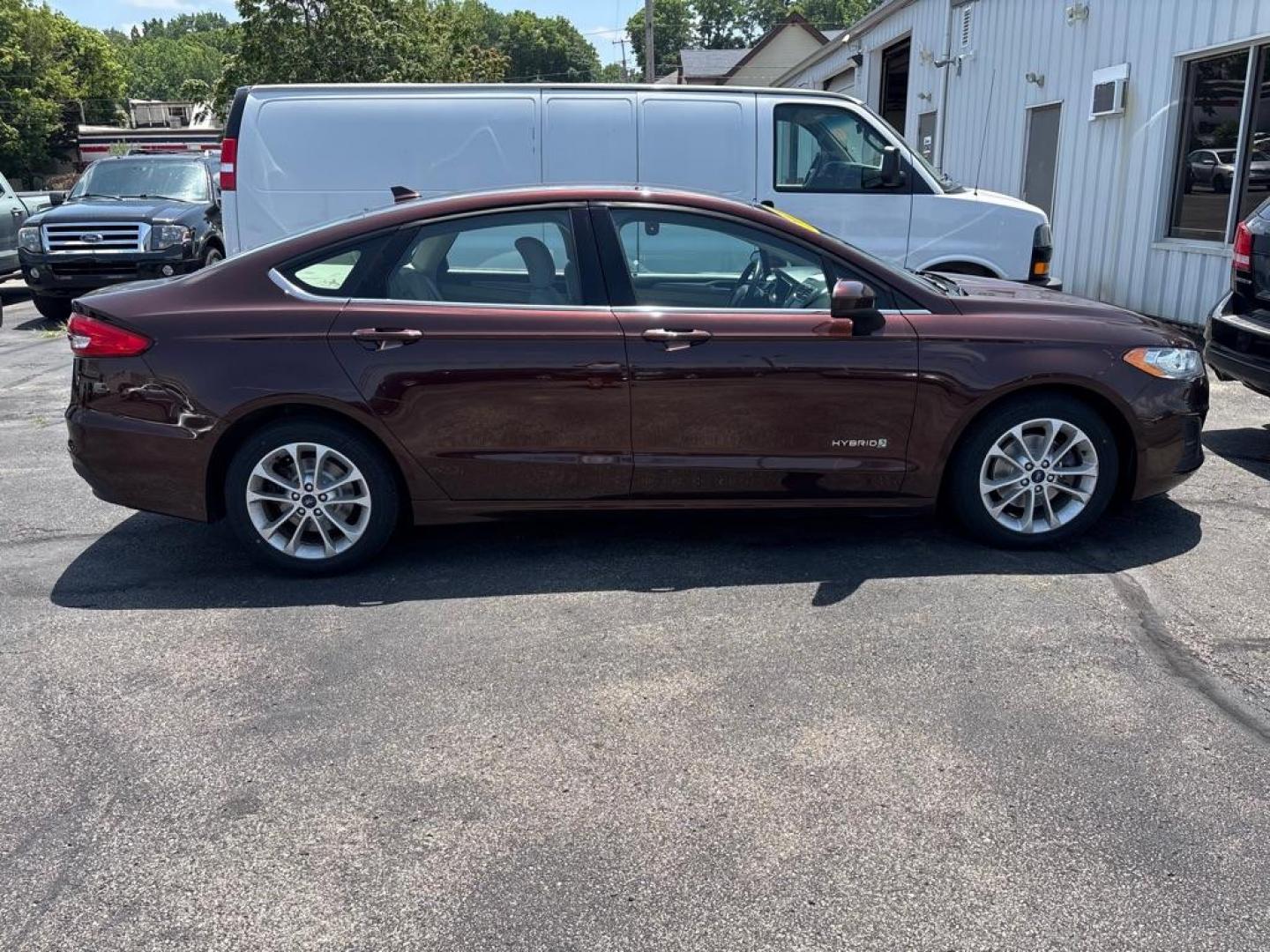2019 RED FORD FUSION SE HYBRID (3FA6P0LUXKR) with an 2.0L engine, Continuously Variable transmission, located at 501 E. Columbia St., Springfield, OH, 45503, (800) 262-7122, 39.925262, -83.801796 - *** New Tires *** New Brakes *** New Cabin and Air filter *** Oil Change *** Inspection *** Hybrid *** Jay North Auto has offered hand picked vehicles since 1965! Our customer's enjoy a NO pressure buying experience with a small town feel. We are a preferred dealer for many local credit unions- Photo#1