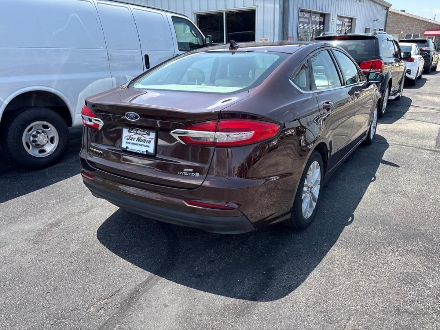 2019 RED FORD FUSION SE HYBRID (3FA6P0LUXKR) with an 2.0L engine, Continuously Variable transmission, located at 501 E. Columbia St., Springfield, OH, 45503, (800) 262-7122, 39.925262, -83.801796 - *** New Tires *** New Brakes *** New Cabin and Air filter *** Oil Change *** Inspection *** Hybrid *** Jay North Auto has offered hand picked vehicles since 1965! Our customer's enjoy a NO pressure buying experience with a small town feel. We are a preferred dealer for many local credit unions- Photo#2