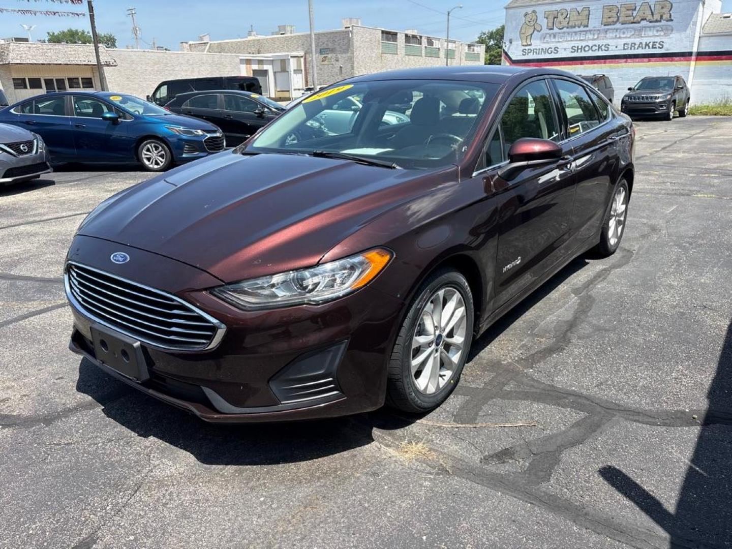 2019 RED FORD FUSION SE HYBRID (3FA6P0LUXKR) with an 2.0L engine, Continuously Variable transmission, located at 501 E. Columbia St., Springfield, OH, 45503, (800) 262-7122, 39.925262, -83.801796 - *** New Tires *** New Brakes *** New Cabin and Air filter *** Oil Change *** Inspection *** Hybrid *** Jay North Auto has offered hand picked vehicles since 1965! Our customer's enjoy a NO pressure buying experience with a small town feel. We are a preferred dealer for many local credit unions- Photo#5