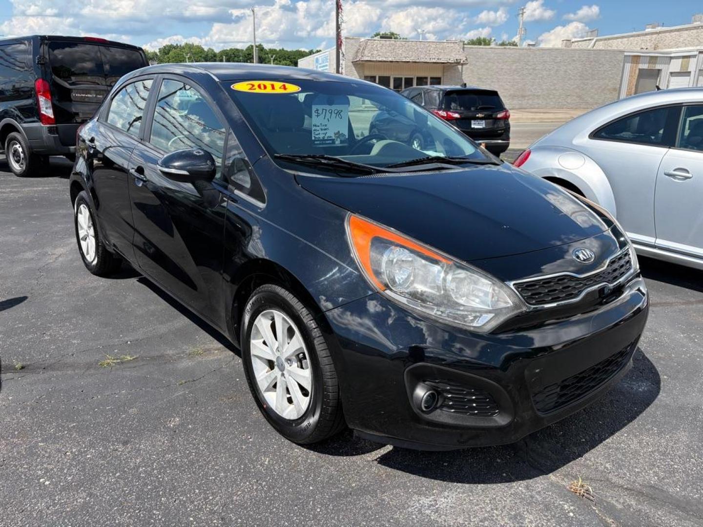 2014 BLACK KIA RIO EX (KNADN5A32E6) with an 1.6L engine, Automatic transmission, located at 501 E. Columbia St., Springfield, OH, 45503, (800) 262-7122, 39.925262, -83.801796 - *** New Tires *** New Battery *** New O2 Sensor *** New Cabin and Air filter *** Oil Change *** Tune Up *** New Wipers *** New Brakes *** New Catalytic Converter *** Back Up Camera *** Power Windows and Locks *** Auto Headlights *** Hatchback *** Alloy Wheels *** Jay North Auto has offered hand - Photo#0