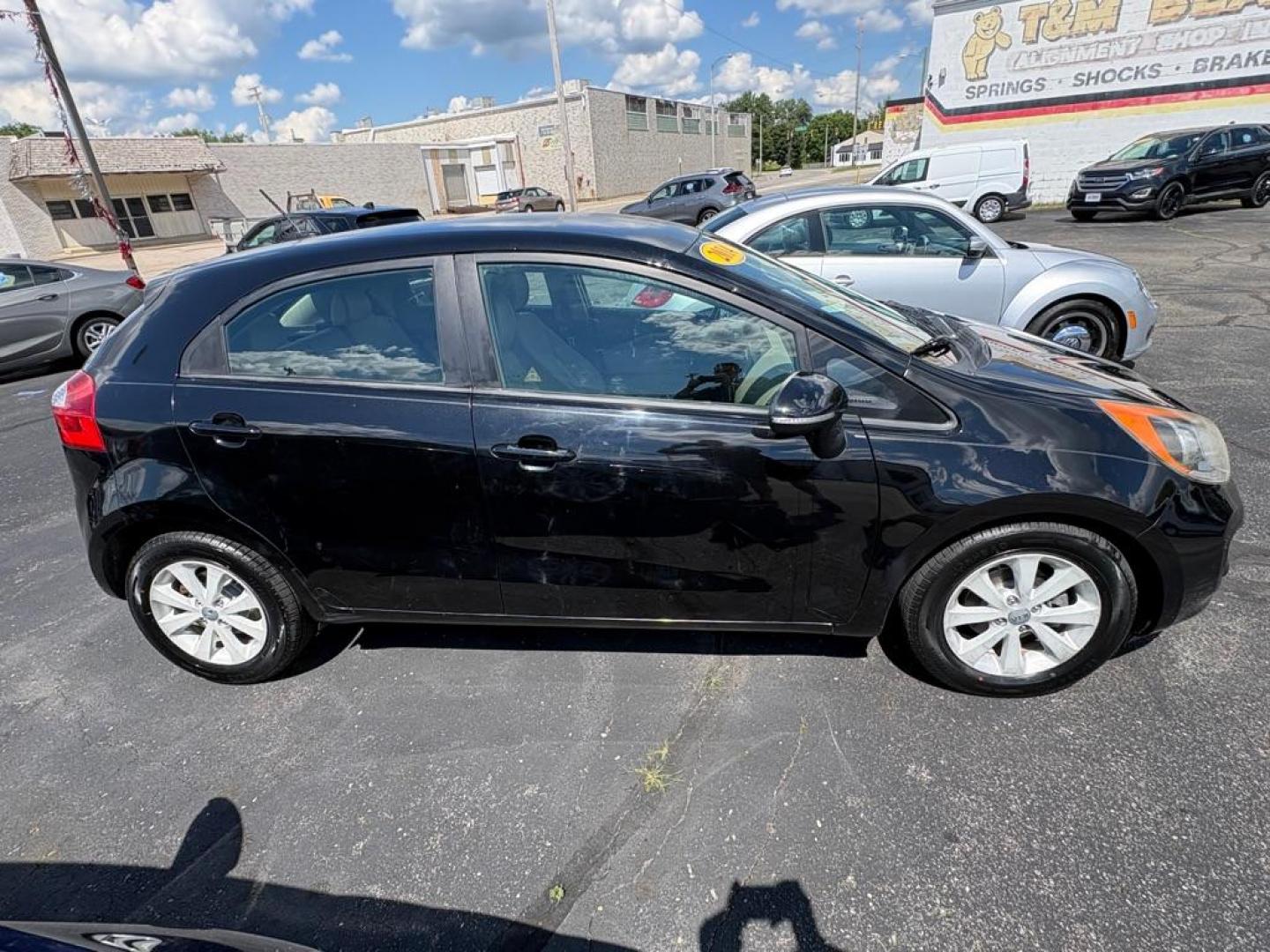 2014 BLACK KIA RIO EX (KNADN5A32E6) with an 1.6L engine, Automatic transmission, located at 501 E. Columbia St., Springfield, OH, 45503, (800) 262-7122, 39.925262, -83.801796 - *** New Tires *** New Battery *** New O2 Sensor *** New Cabin and Air filter *** Oil Change *** Tune Up *** New Wipers *** New Brakes *** New Catalytic Converter *** Back Up Camera *** Power Windows and Locks *** Auto Headlights *** Hatchback *** Alloy Wheels *** Jay North Auto has offered hand - Photo#1