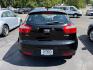 2014 BLACK KIA RIO EX (KNADN5A32E6) with an 1.6L engine, Automatic transmission, located at 501 E. Columbia St., Springfield, OH, 45503, (800) 262-7122, 39.925262, -83.801796 - *** New Tires *** New Battery *** New O2 Sensor *** New Cabin and Air filter *** Oil Change *** Tune Up *** New Wipers *** New Brakes *** New Catalytic Converter *** Back Up Camera *** Power Windows and Locks *** Auto Headlights *** Hatchback *** Alloy Wheels *** Jay North Auto has offered hand - Photo#3
