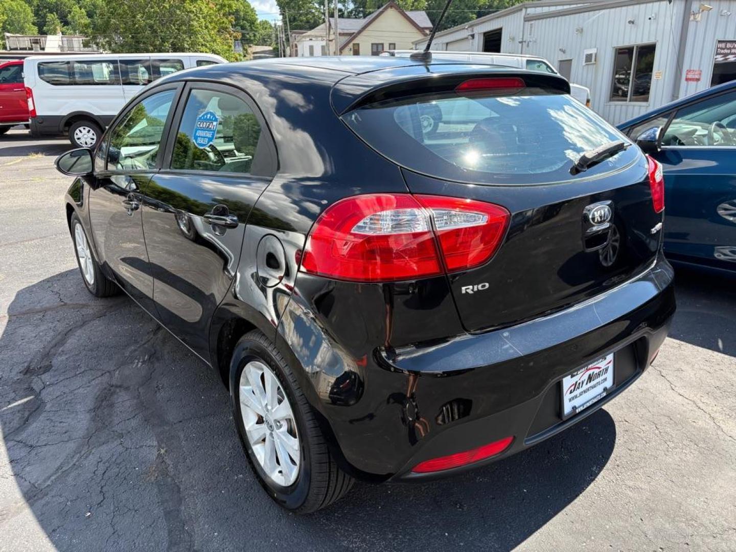 2014 BLACK KIA RIO EX (KNADN5A32E6) with an 1.6L engine, Automatic transmission, located at 501 E. Columbia St., Springfield, OH, 45503, (800) 262-7122, 39.925262, -83.801796 - *** New Tires *** New Battery *** New O2 Sensor *** New Cabin and Air filter *** Oil Change *** Tune Up *** New Wipers *** New Brakes *** New Catalytic Converter *** Back Up Camera *** Power Windows and Locks *** Auto Headlights *** Hatchback *** Alloy Wheels *** Jay North Auto has offered hand - Photo#4