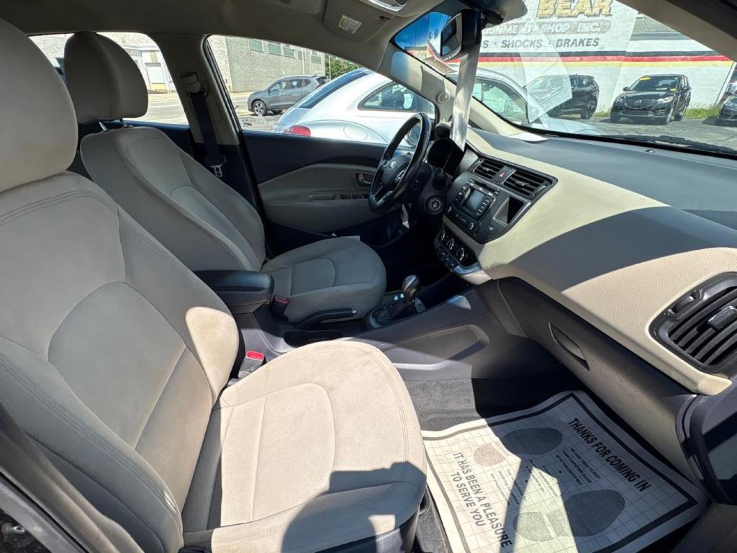2014 BLACK KIA RIO EX (KNADN5A32E6) with an 1.6L engine, Automatic transmission, located at 501 E. Columbia St., Springfield, OH, 45503, (800) 262-7122, 39.925262, -83.801796 - *** New Tires *** New Battery *** New O2 Sensor *** New Cabin and Air filter *** Oil Change *** Tune Up *** New Wipers *** New Brakes *** New Catalytic Converter *** Back Up Camera *** Power Windows and Locks *** Auto Headlights *** Hatchback *** Alloy Wheels *** Jay North Auto has offered hand - Photo#16